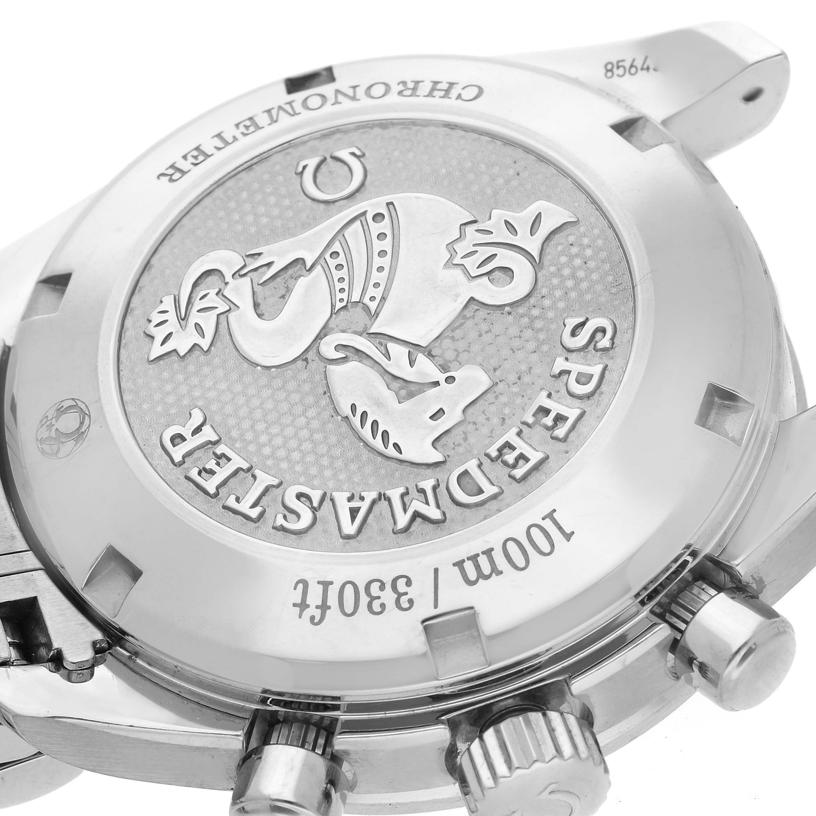 The image shows the back of an Omega Speedmaster 324.30.38.40.04.001 Men
s Stainless Steel White Dial 324.30.38.40.04.001 Men
s Stainless Steel White Dial watch, highlighting the engraved logo and chronograph buttons.