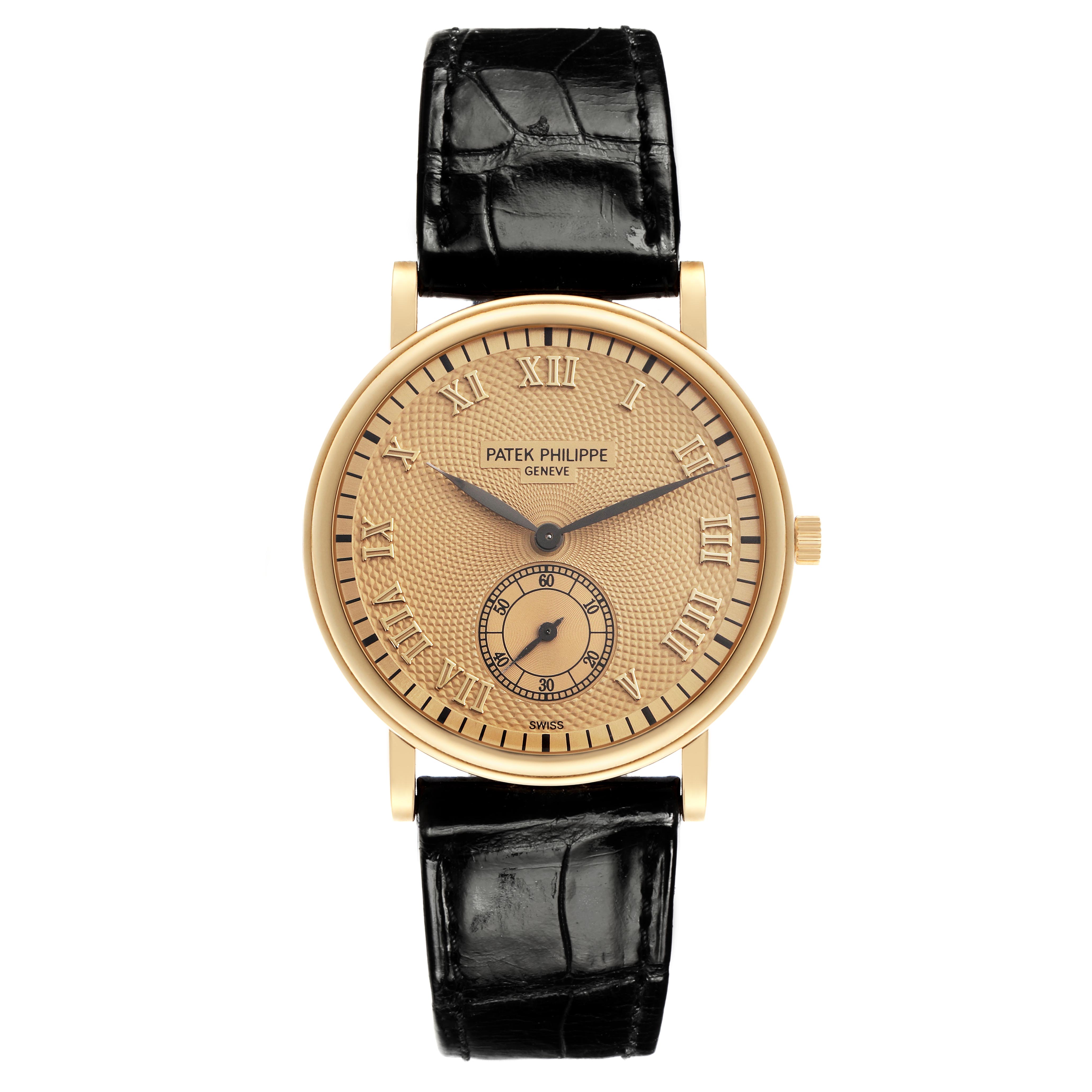 The Patek Philippe Calatrava 5022J-001 Men
s Yellow Gold Champagne Dial 5022J-001 Men
s Yellow Gold Champagne Dial watch is shown from the front, highlighting its dial, case, and black leather strap.