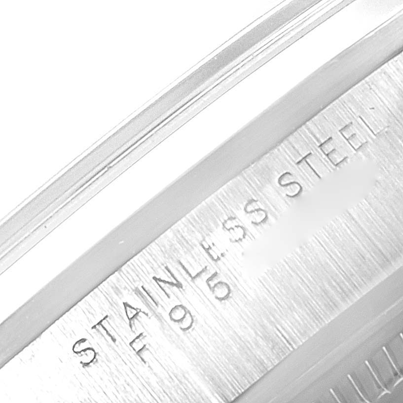 This close-up image shows the engraving on the stainless steel case of a Rolex Air-King 14000 Men's Stainless Steel Silver Dial 14000 Men's Stainless Steel Silver Dial watch.