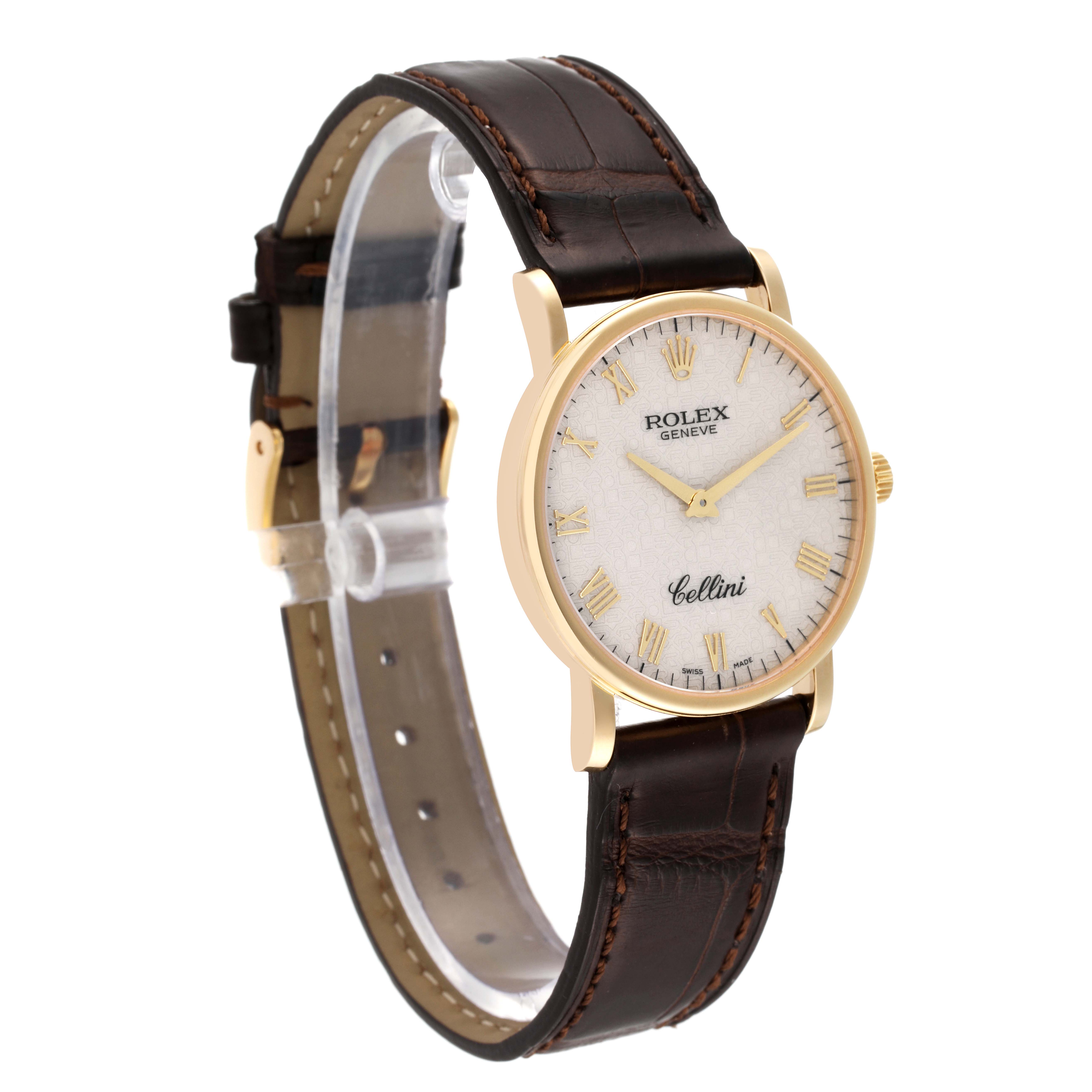 The Rolex Cellini 5115 Men's Yellow Gold Beige Dial 5115 Men's Yellow Gold Beige Dial watch is shown at a slight angle, displaying the face, leather strap, and gold case with Roman numeral markers.