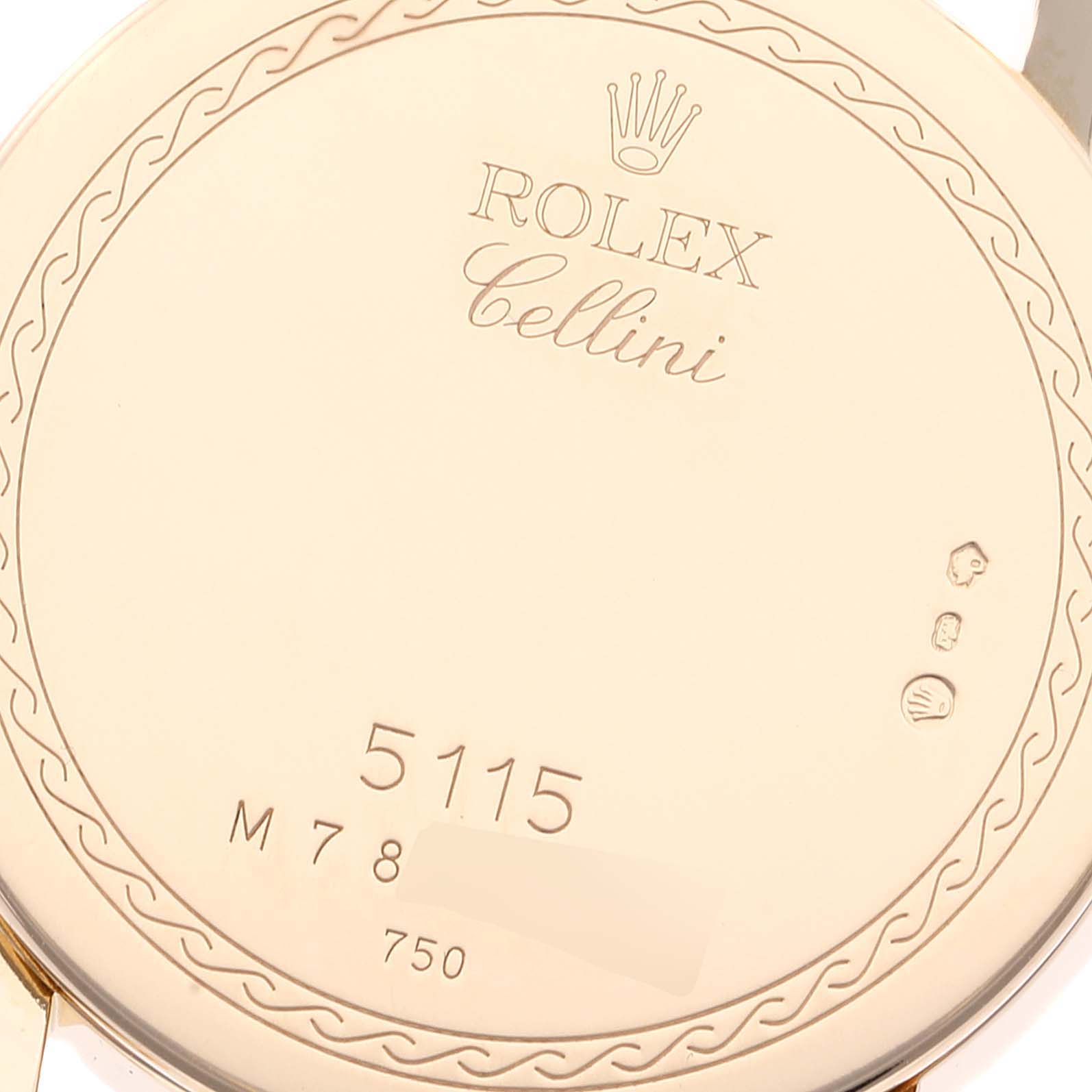The image shows the back case of a Rolex Cellini 5115 Men's Yellow Gold Beige Dial 5115 Men's Yellow Gold Beige Dial watch with model number 5115 and various engravings.