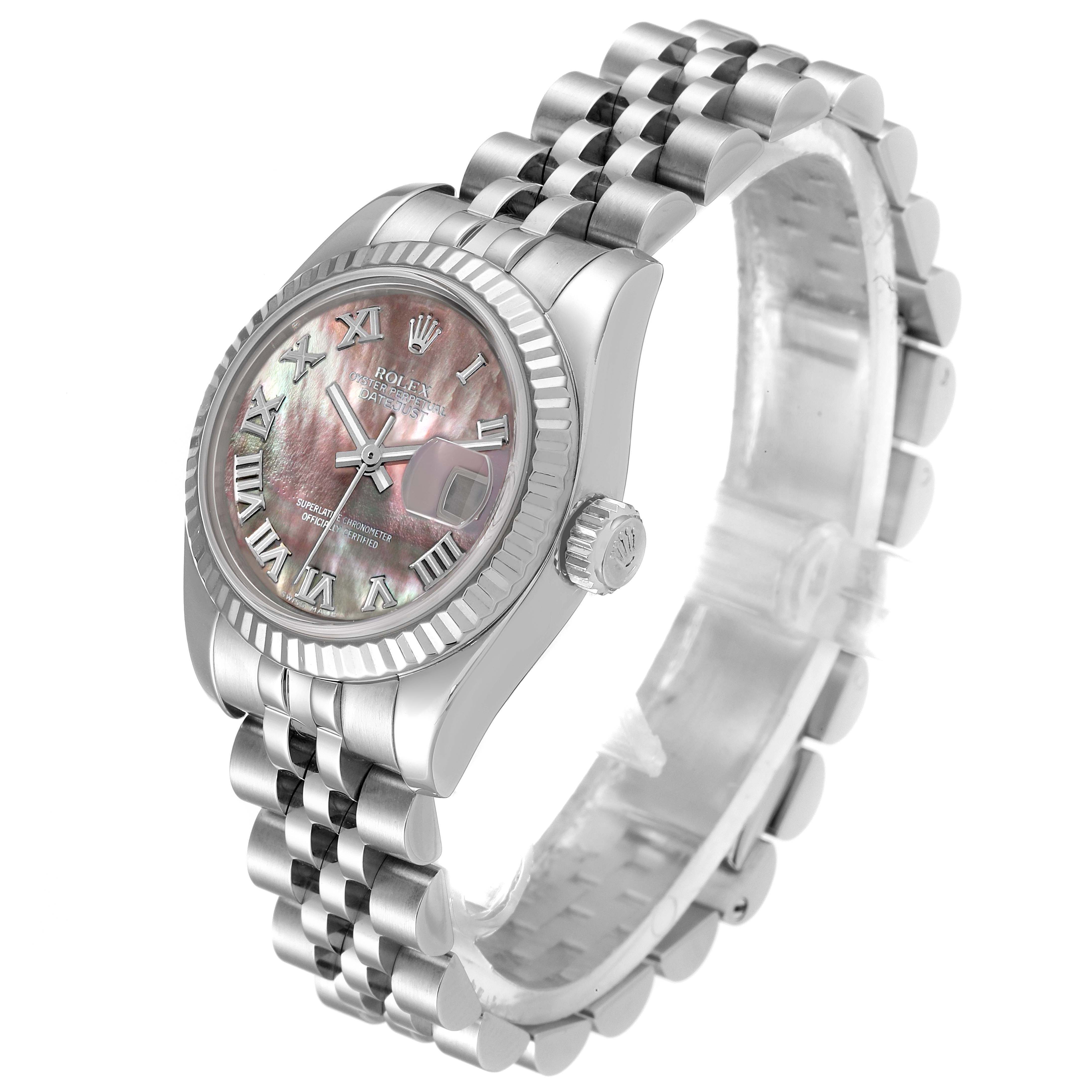 The image shows a side angle of the Rolex Datejust 179174 Women's Stainless Steel Mother of Pearl Dial 179174 Women's Stainless Steel Mother of Pearl Dial watch, highlighting the bracelet, crown, bezel, and dial.