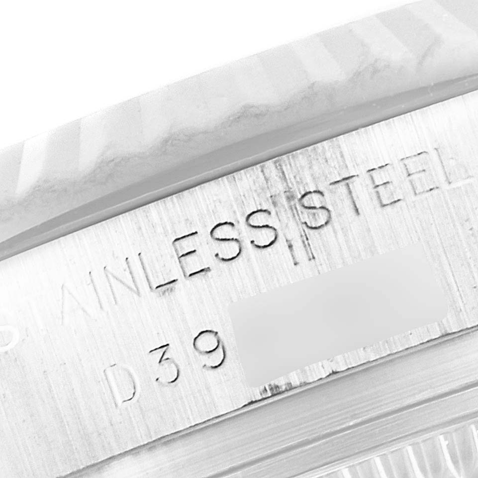 The image shows a close-up view of the stainless steel case and part of the fluted bezel of a Rolex Datejust 179174 Women's Stainless Steel Mother of Pearl Dial 179174 Women's Stainless Steel Mother of Pearl Dial watch.