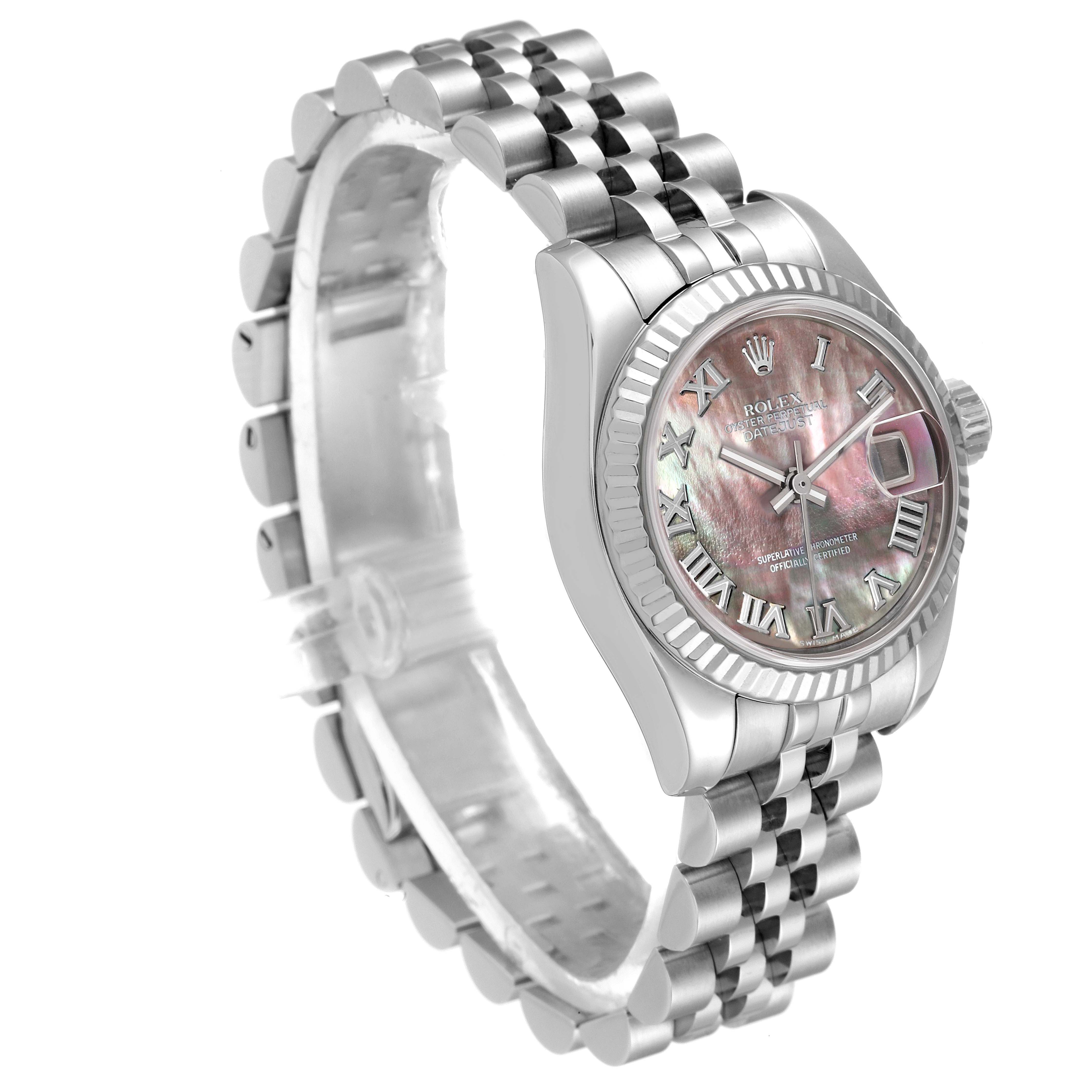 The Rolex Datejust 179174 Women's Stainless Steel Mother of Pearl Dial 179174 Women's Stainless Steel Mother of Pearl Dial watch is shown from a front-side angle, displaying its mother-of-pearl dial, Roman numeral markers, and Jubilee bracelet.