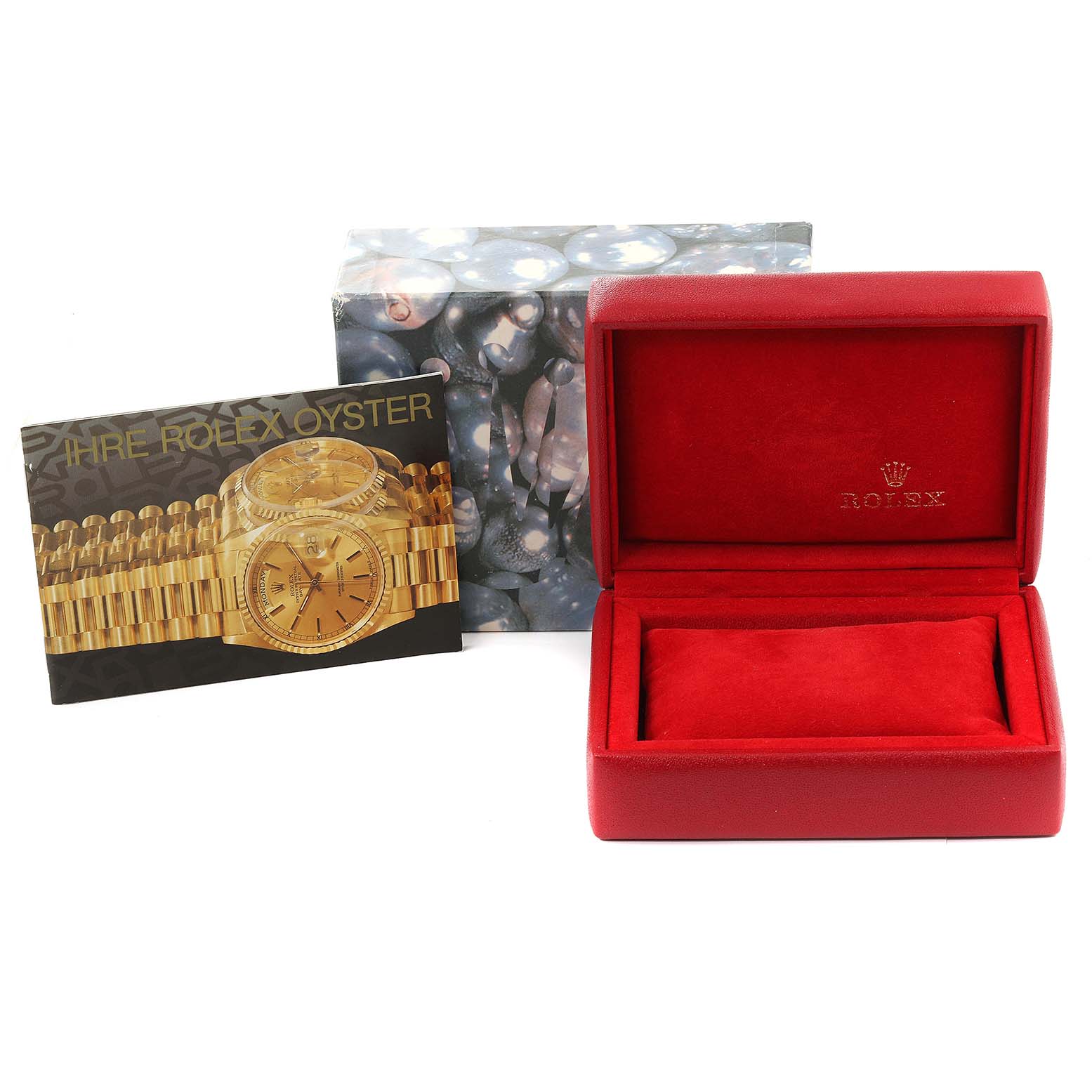 This image shows the packaging, manual, and an empty watch box for the Rolex Datejust 69173 Women's Steel and Gold (two tone) White Dial 69173 Women's Steel and Gold (two tone) White Dial model.