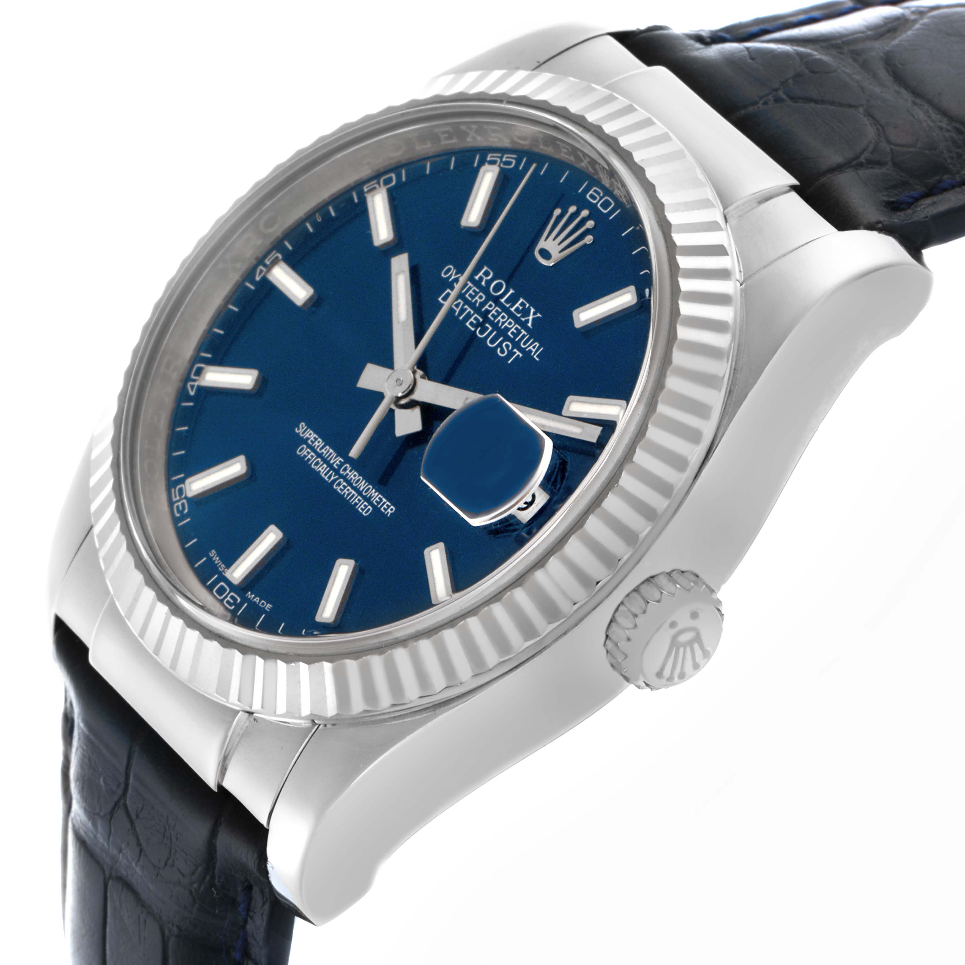 The Rolex Datejust 116139 Men
s White Gold Blue Dial 116139 Men
s White Gold Blue Dial watch is shown at a slight side angle, highlighting the blue dial, fluted bezel, and the crown.