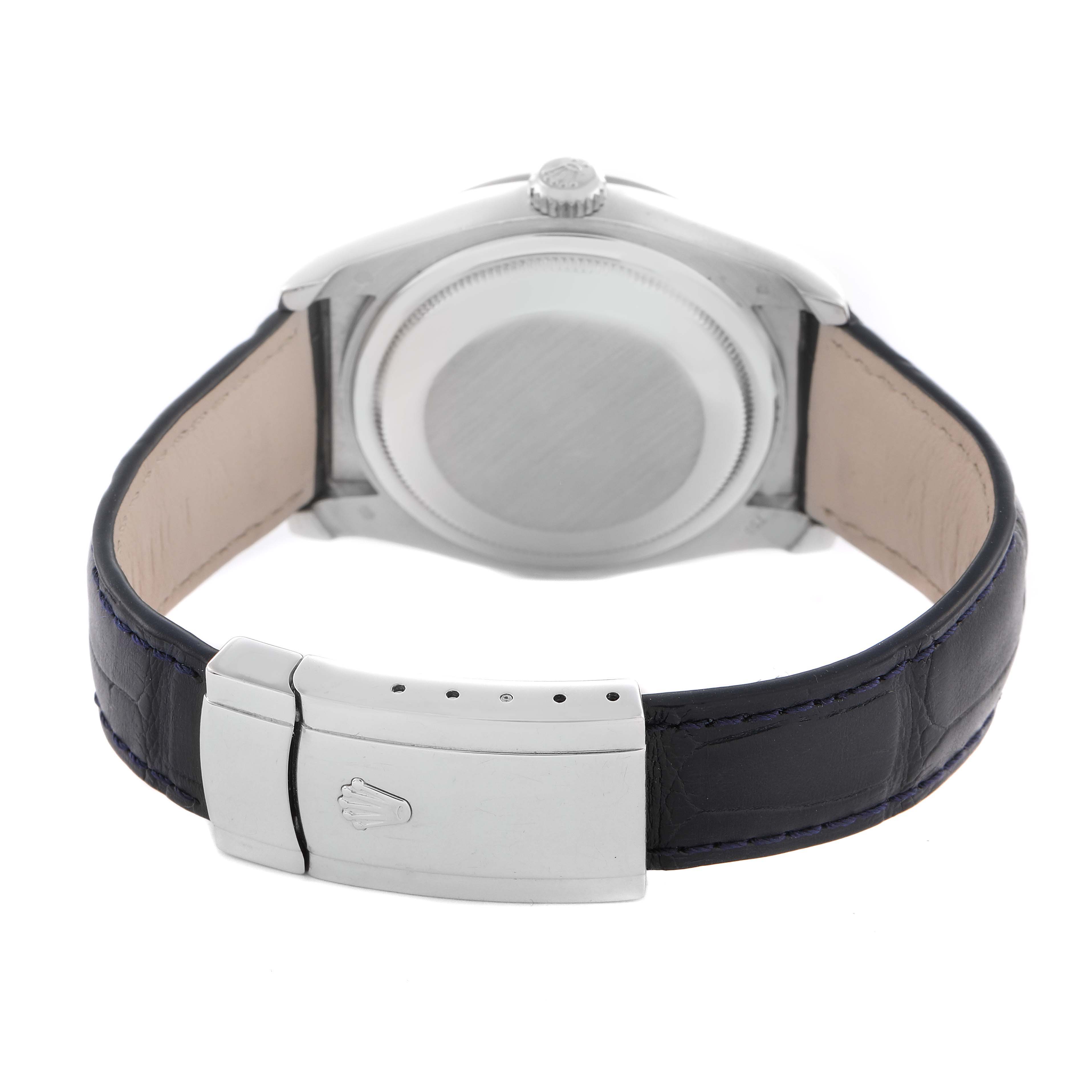 The image shows the back view of a Rolex Datejust 116139 Men
s White Gold Blue Dial 116139 Men
s White Gold Blue Dial watch, highlighting the clasp, case back, and leather strap.