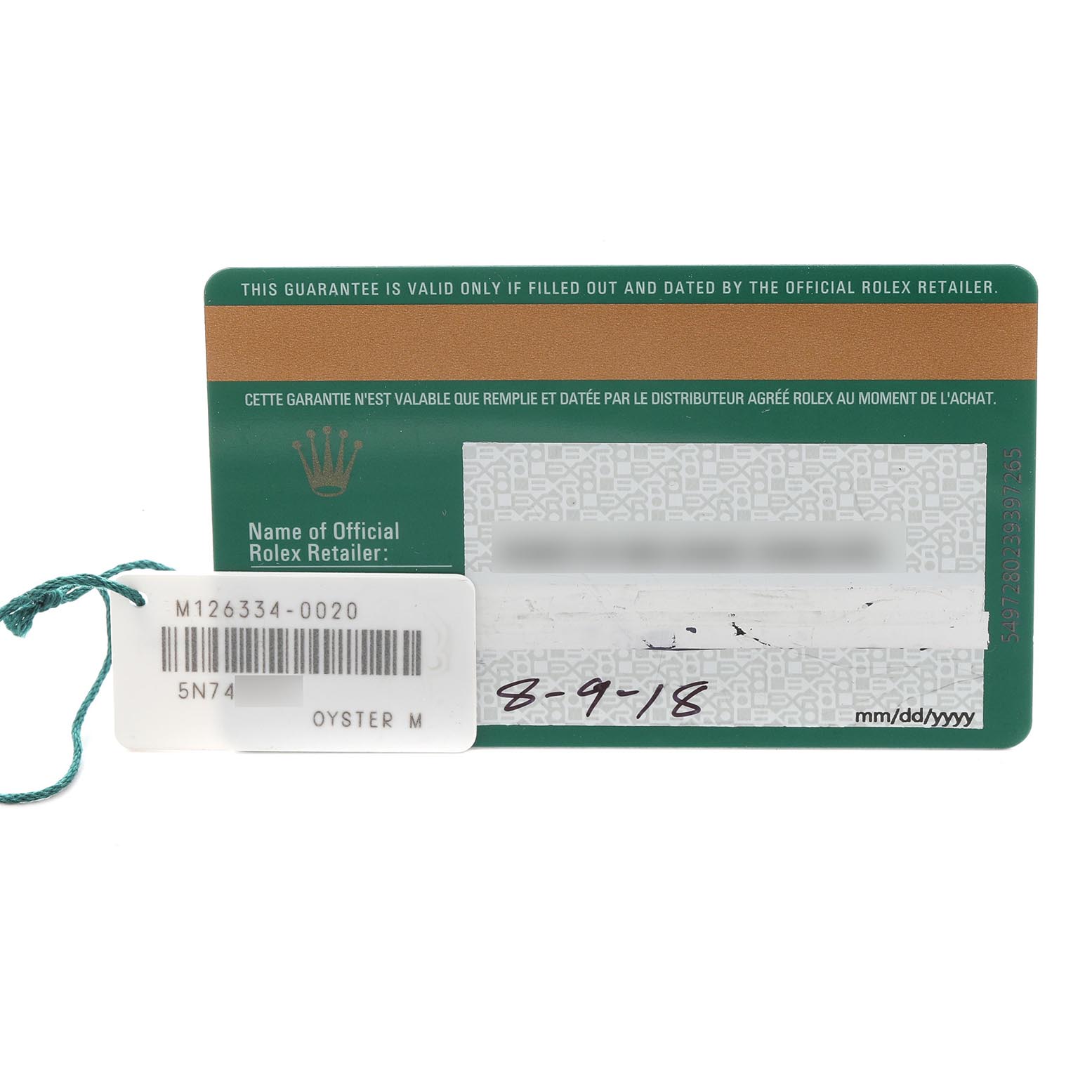 The image shows the guarantee card and tag for a Rolex Datejust 41 126334 Men
s Stainless Steel Mother of Pearl Dial 126334 Men
s Stainless Steel Mother of Pearl Dial, including serial and model numbers.