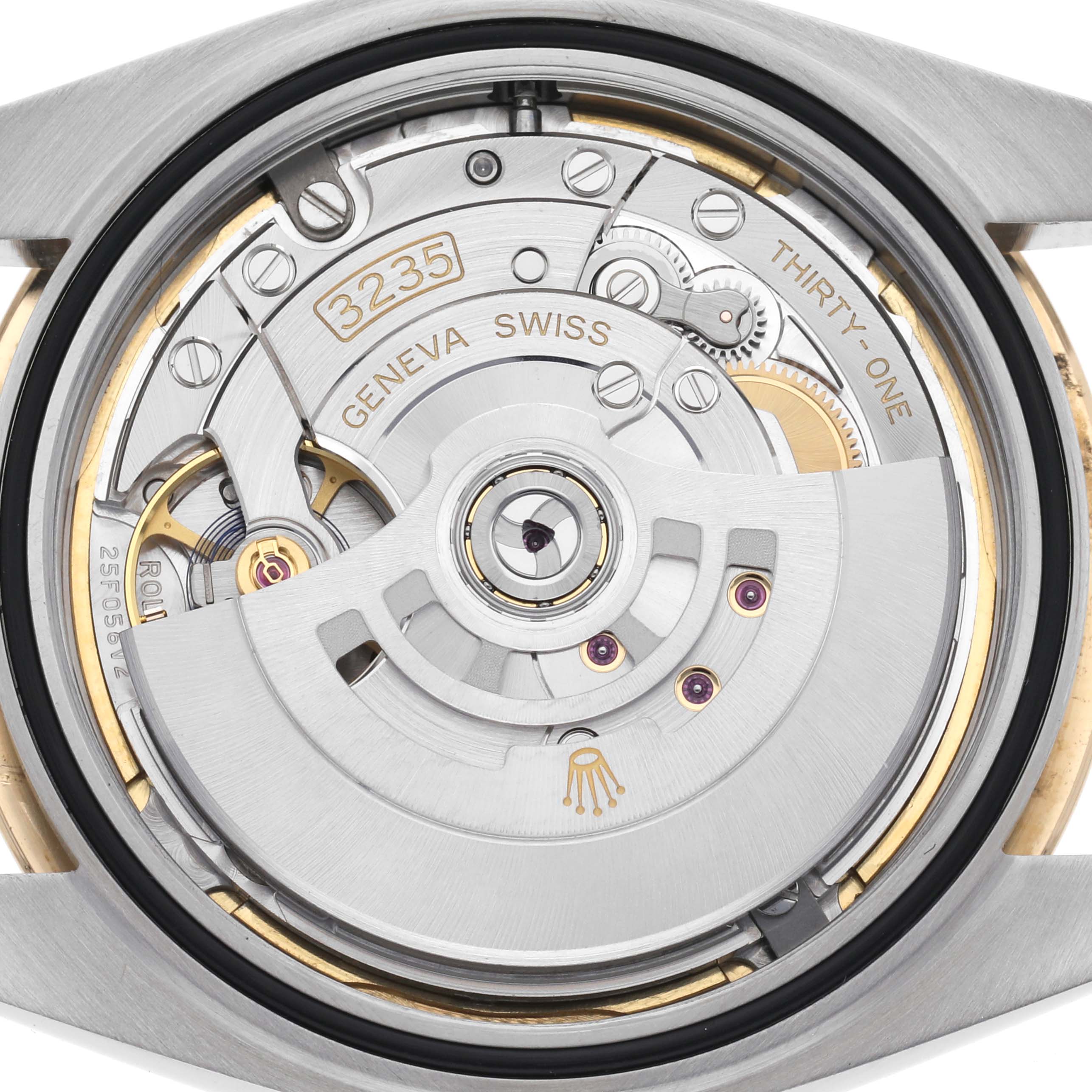 The image shows the movement mechanism of a Rolex Datejust 41 126333 Men
s Steel and Gold (two tone) Champagne Dial 126333 Men
s Steel and Gold (two tone) Champagne Dial from a top-down view, highlighting its intricate components.