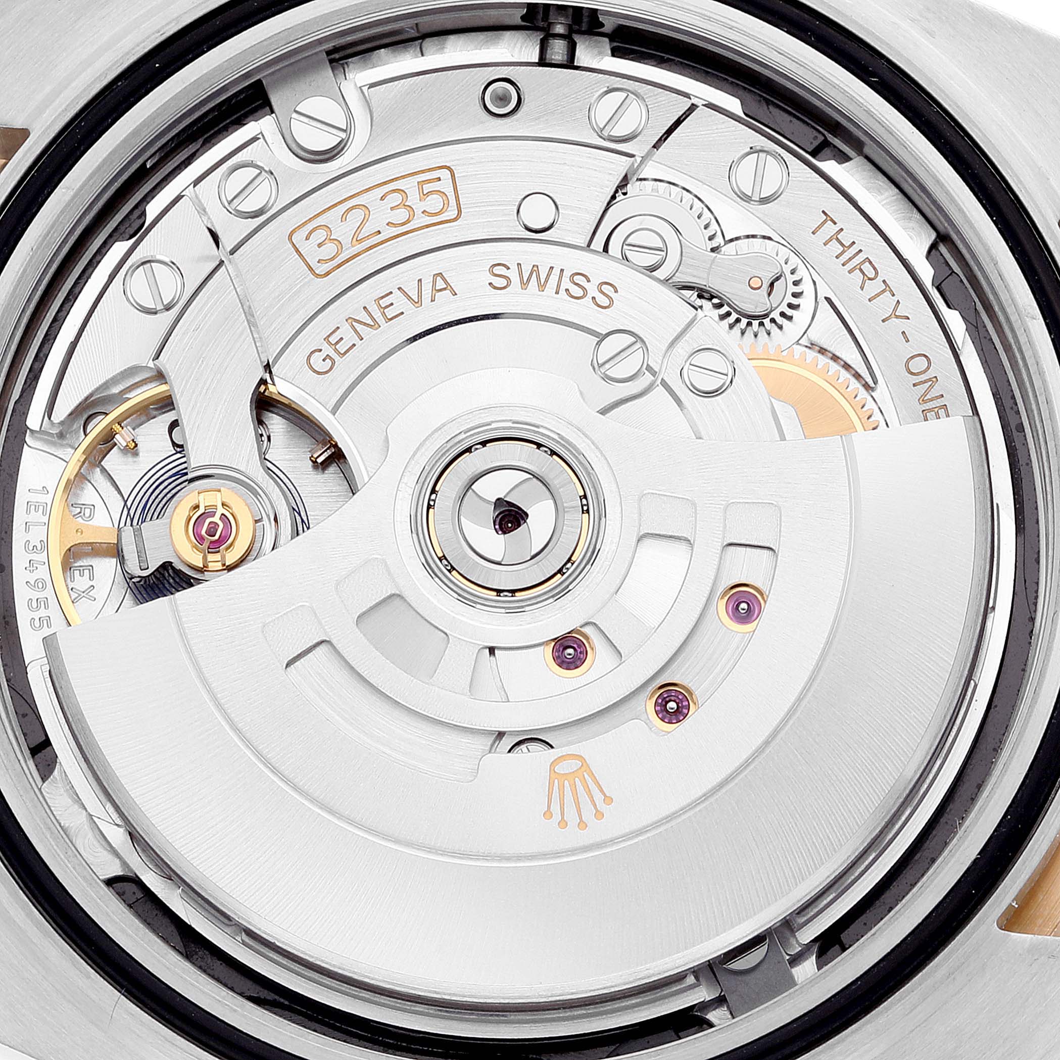 This image shows a close-up view of the movement mechanism of a Rolex Datejust 41 126333 Men's Steel and Gold (two tone) Black Dial 126333 Men's Steel and Gold (two tone) Black Dial model watch.