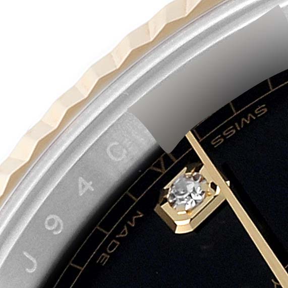 The close-up angle shows the bezel, part of the dial, and a diamond hour marker of the Rolex Datejust 41 126333 Men's Steel and Gold (two tone) Black Dial 126333 Men's Steel and Gold (two tone) Black Dial.