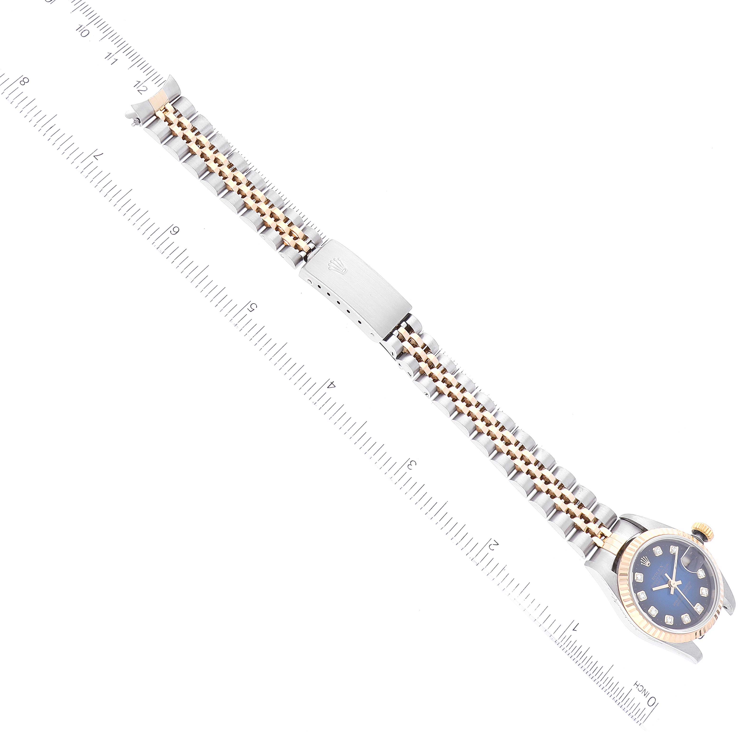 The image shows a Rolex Datejust 69173 Women's Steel and Gold (two tone) Blue Dial 69173 Women's Steel and Gold (two tone) Blue Dial watch from an overhead angle, displaying the dial, bezel, bracelet, and clasp.