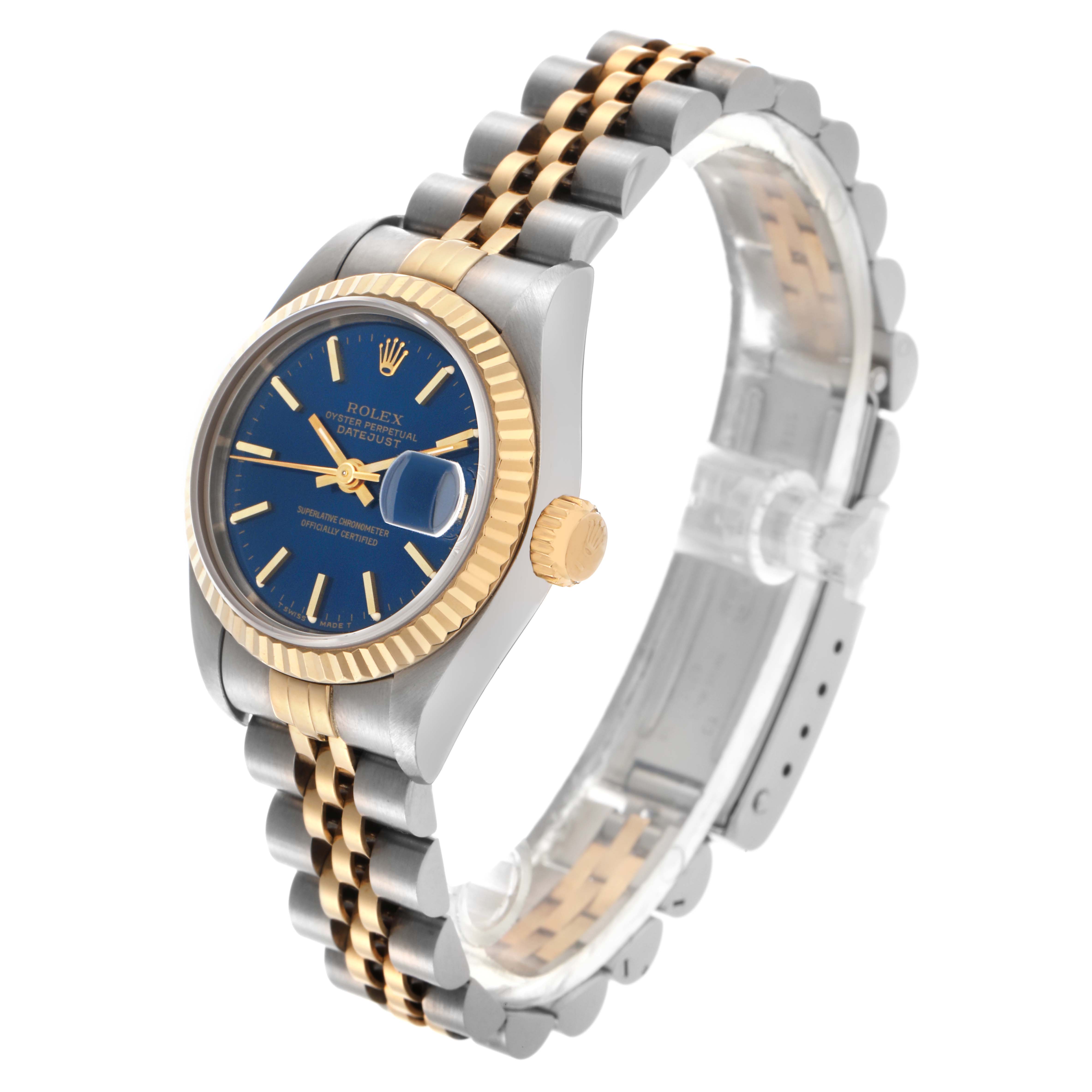The Rolex Datejust 69173 Women
s Steel and Gold (two tone) Blue Dial 69173 Women
s Steel and Gold (two tone) Blue Dial watch is shown at a three-quarter angle, highlighting the blue dial, two-tone bracelet, fluted bezel, and cyclops lens.
