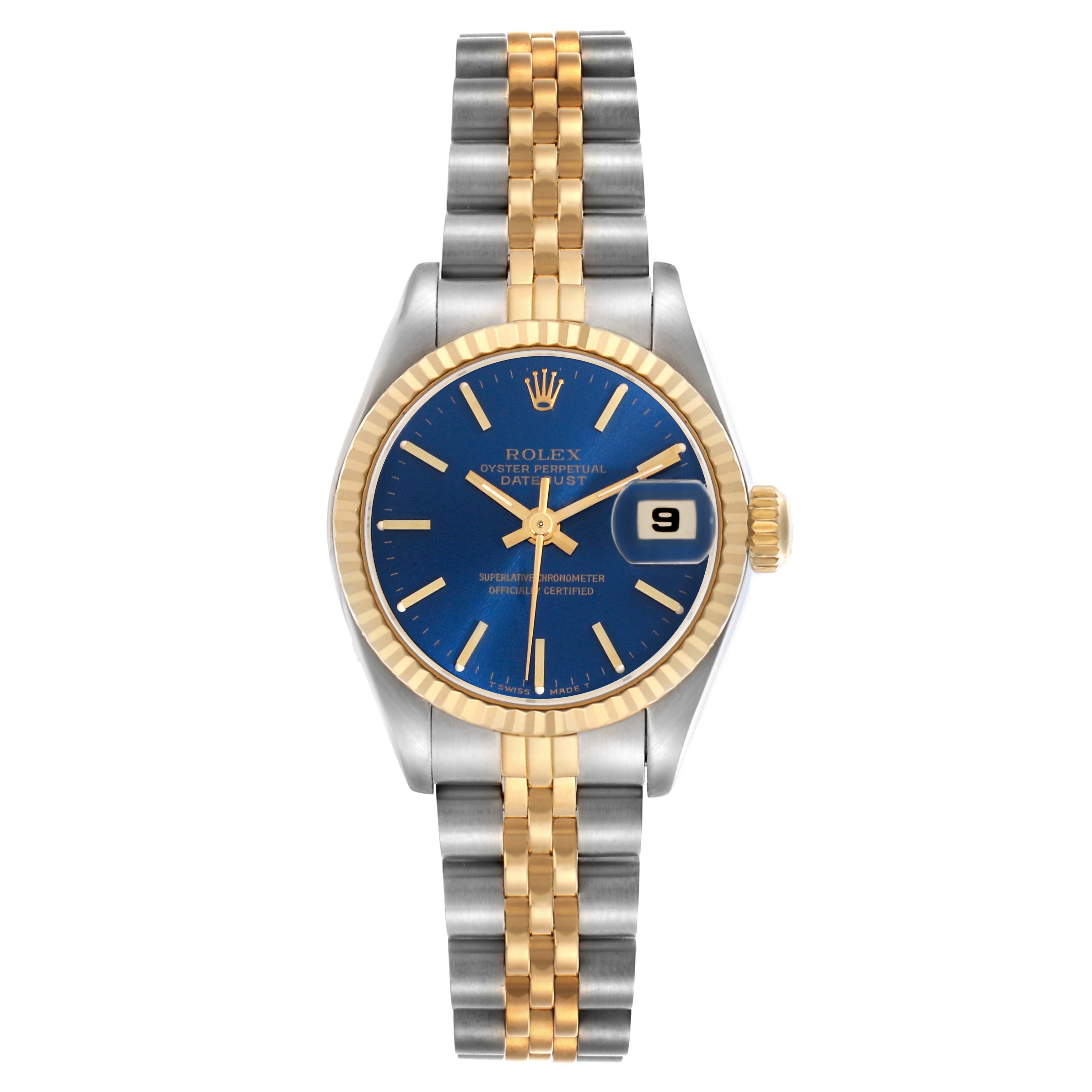 The Rolex Datejust 69173 Women
s Steel and Gold (two tone) Blue Dial 69173 Women
s Steel and Gold (two tone) Blue Dial watch is shown from a top view, displaying its blue dial, gold fluted bezel, and two-tone bracelet.