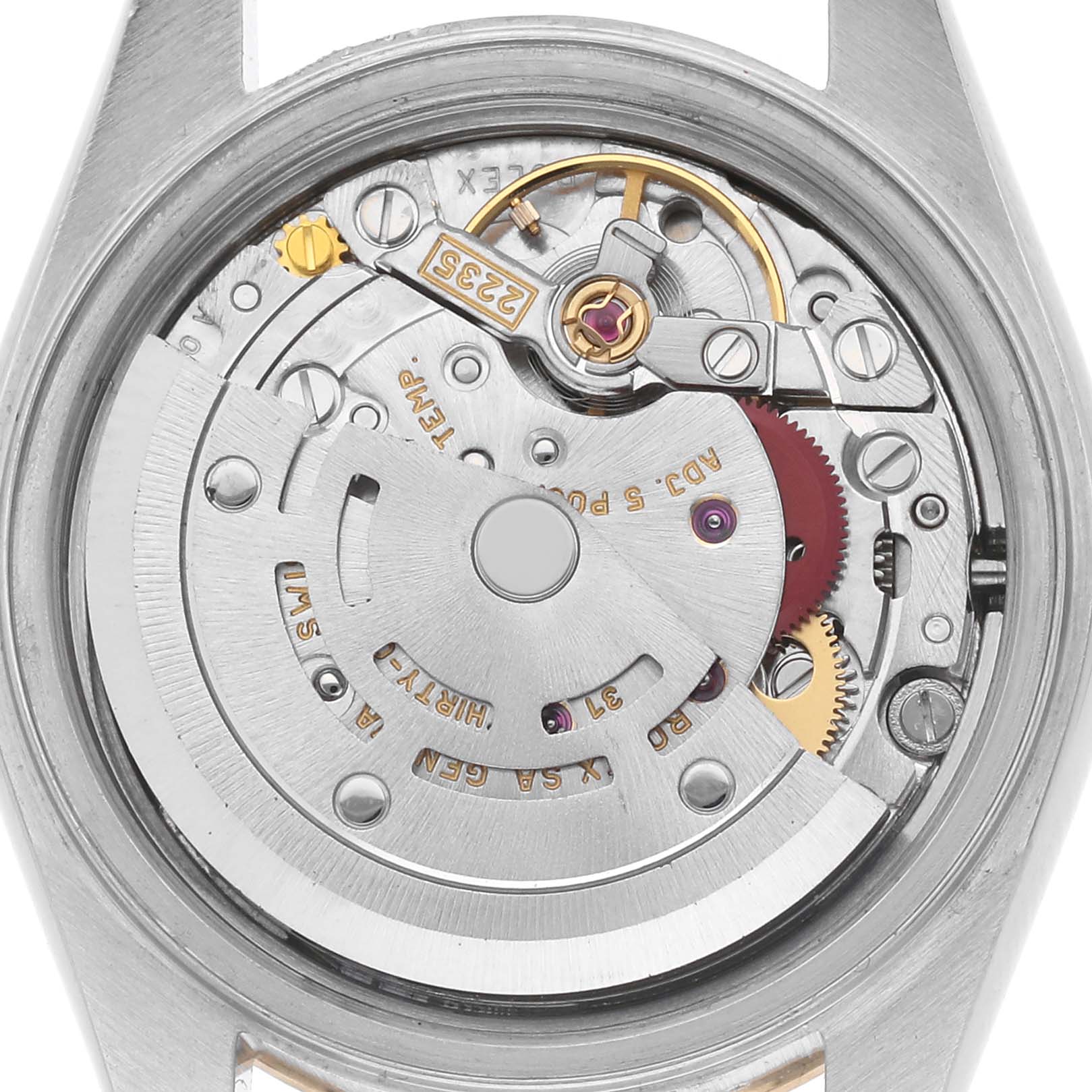 This image shows the movement of a Rolex Datejust 79163 Women's Steel and Gold (two tone) Champagne Dial 79163 Women's Steel and Gold (two tone) Champagne Dial watch from a rear view, focusing on its intricate mechanical parts.