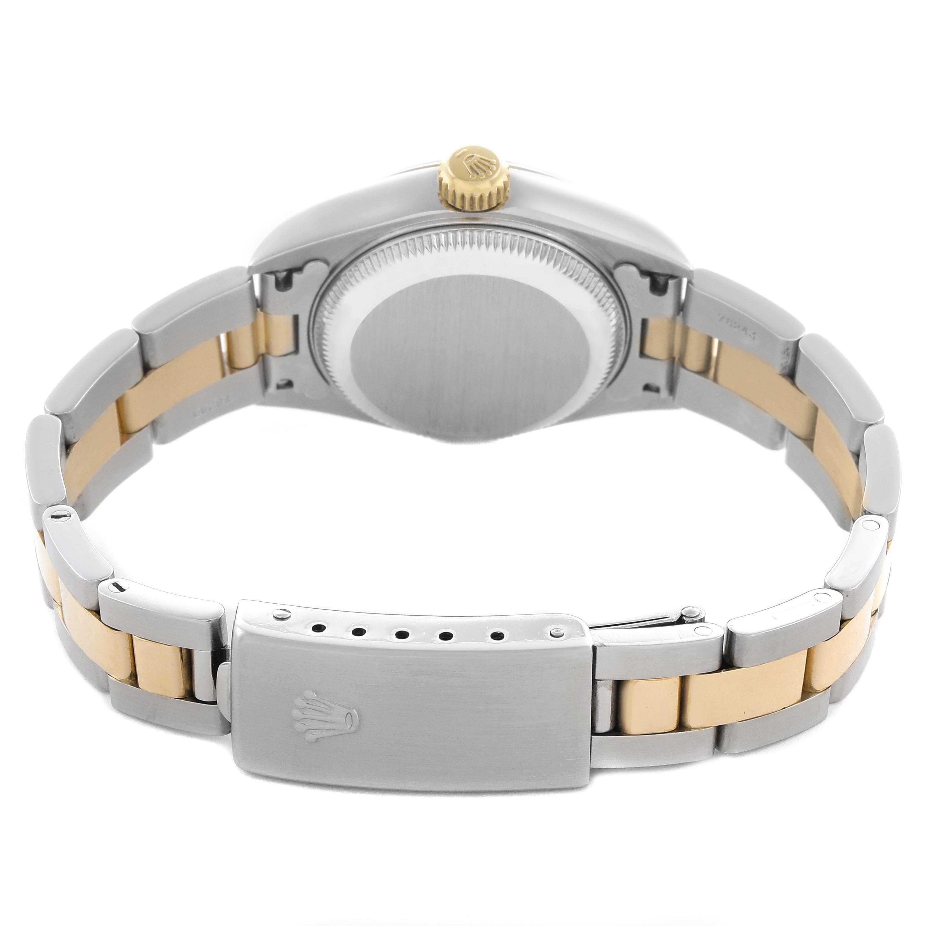The image shows the back of the Rolex Datejust 79163 Women's Steel and Gold (two tone) Grey Dial 79163 Women's Steel and Gold (two tone) Grey Dial watch, highlighting the case back, bracelet, and clasp with the logo.