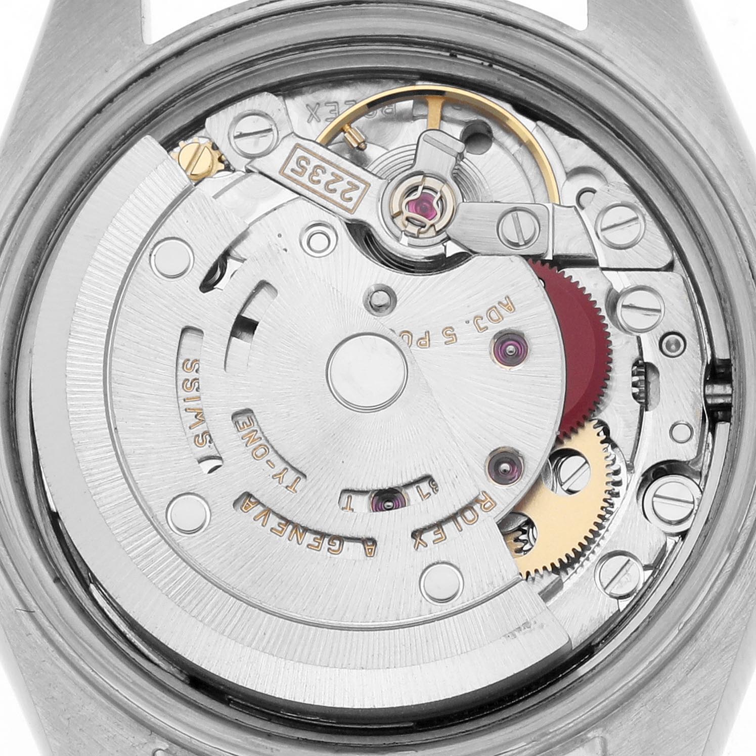 The image shows the movement of a Rolex Datejust 79163 Women's Steel and Gold (two tone) Grey Dial 79163 Women's Steel and Gold (two tone) Grey Dial watch viewed from the back, highlighting gears and the rotor.