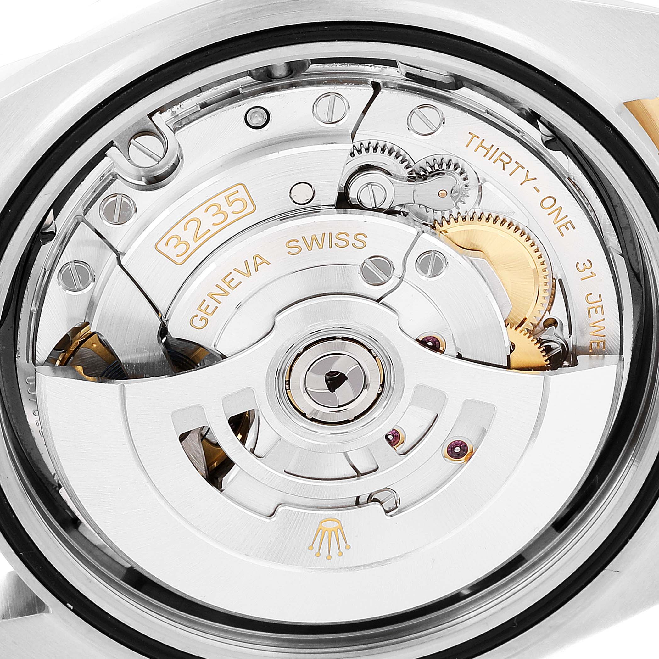 This is an up-close view of the movement and mechanical parts inside the Rolex Datejust 41 126333 Men's Steel and Gold (two tone) Grey Dial 126333 Men's Steel and Gold (two tone) Grey Dial watch.