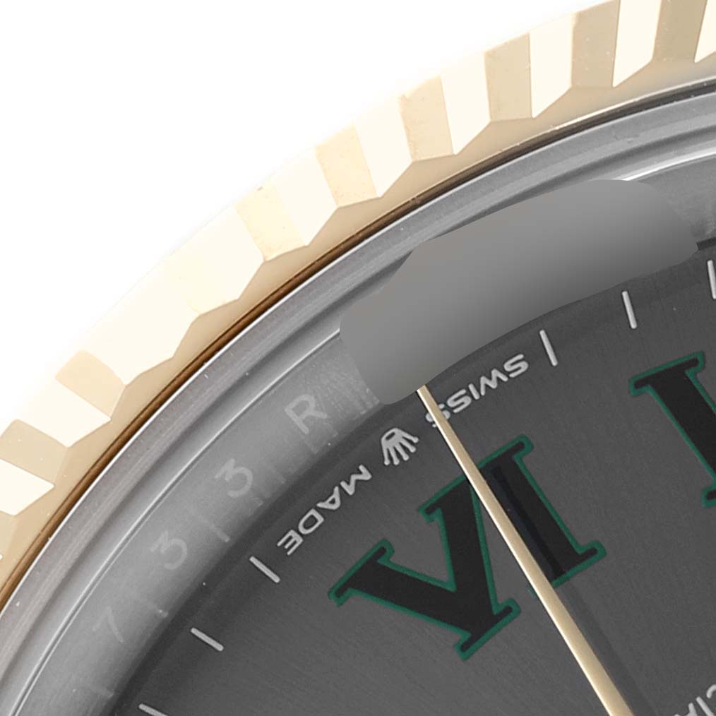 This image shows a close-up angle of the face and fluted bezel of a Rolex Datejust 41 126333 Men's Steel and Gold (two tone) Grey Dial 126333 Men's Steel and Gold (two tone) Grey Dial watch.