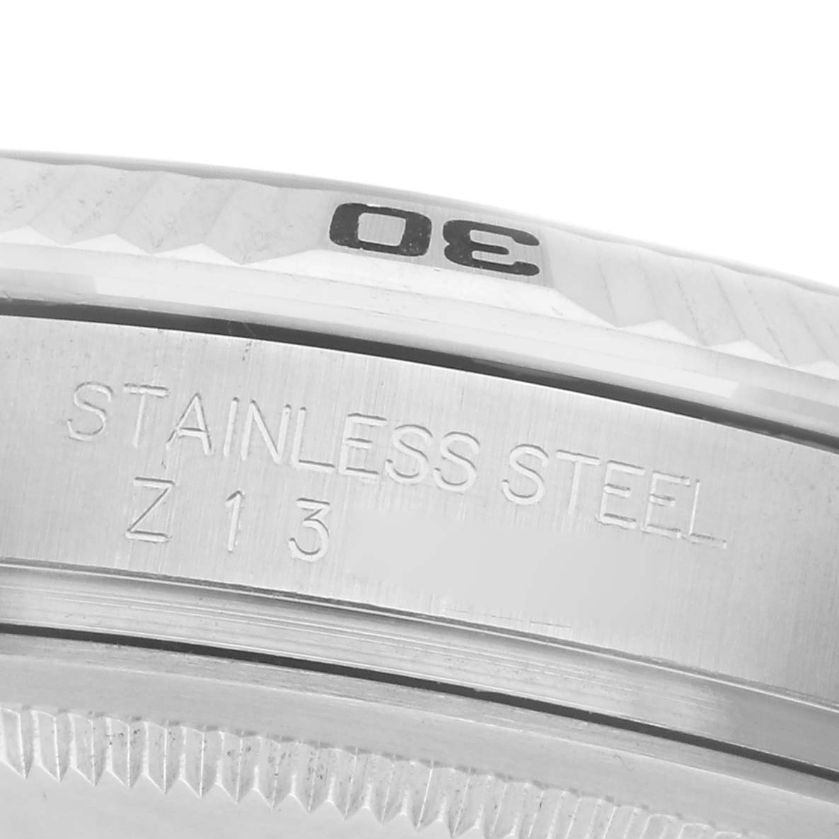 The image shows a close-up side view of the stainless steel bezel and case of a Rolex Turn-o-Graph 116264 Men
s Stainless Steel Black Dial 116264 Men
s Stainless Steel Black Dial watch.