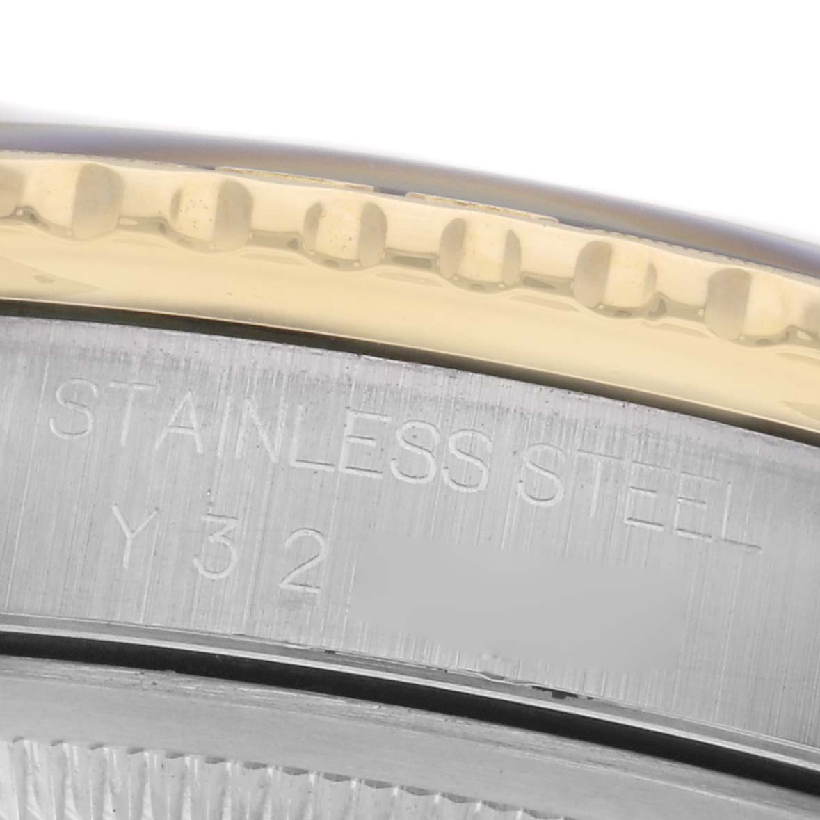 The image shows a close-up of the bezel and part of the case with engraving on a Rolex Turn-o-Graph 16263 Men
s Steel and Gold (two tone) Black Dial 16263 Men
s Steel and Gold (two tone) Black Dial watch.