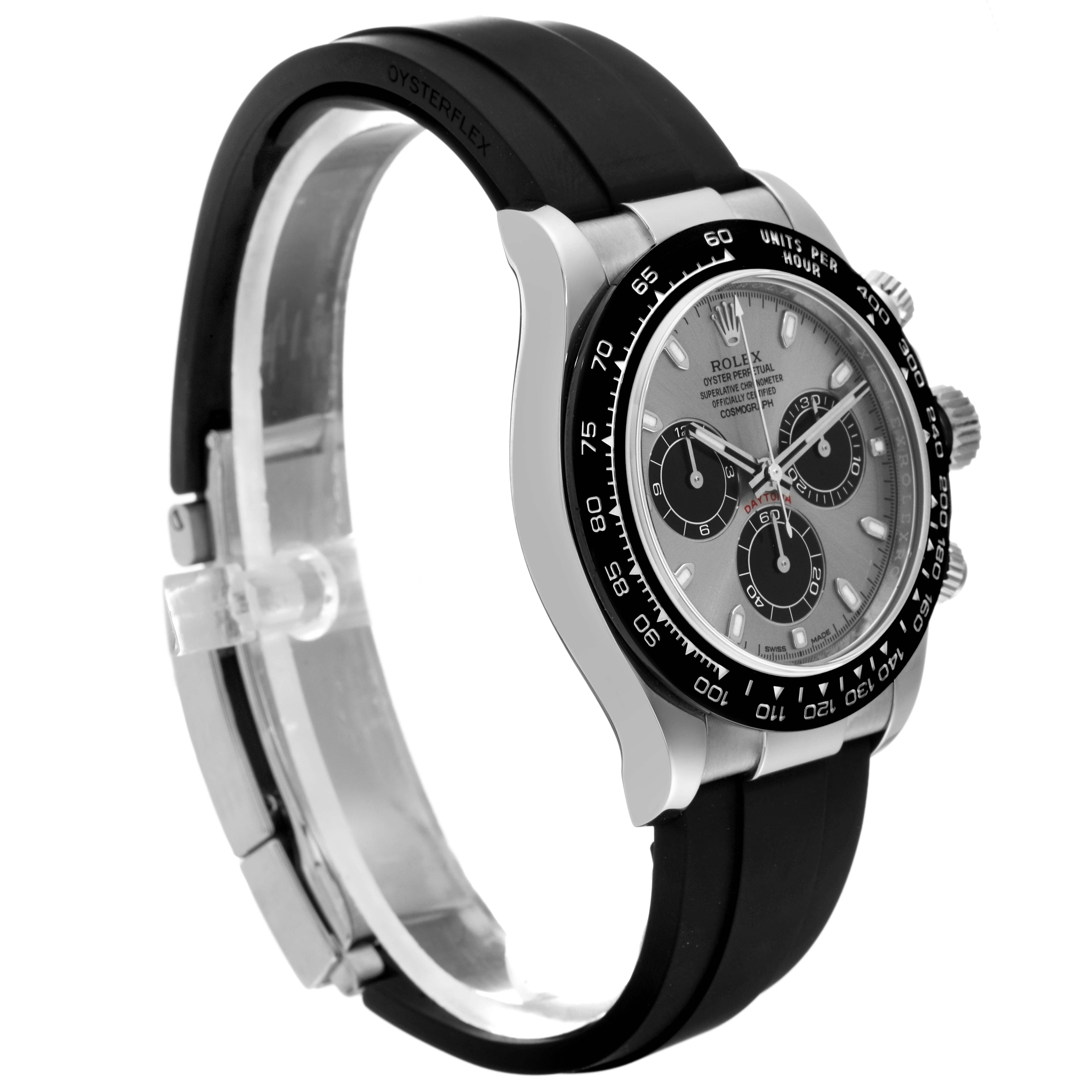 The image shows a side angle view of a Rolex Daytona 116519 Men's White Gold Grey Dial 116519 Men's White Gold Grey Dial watch with its face, bezel, crown, and rubber strap visible.