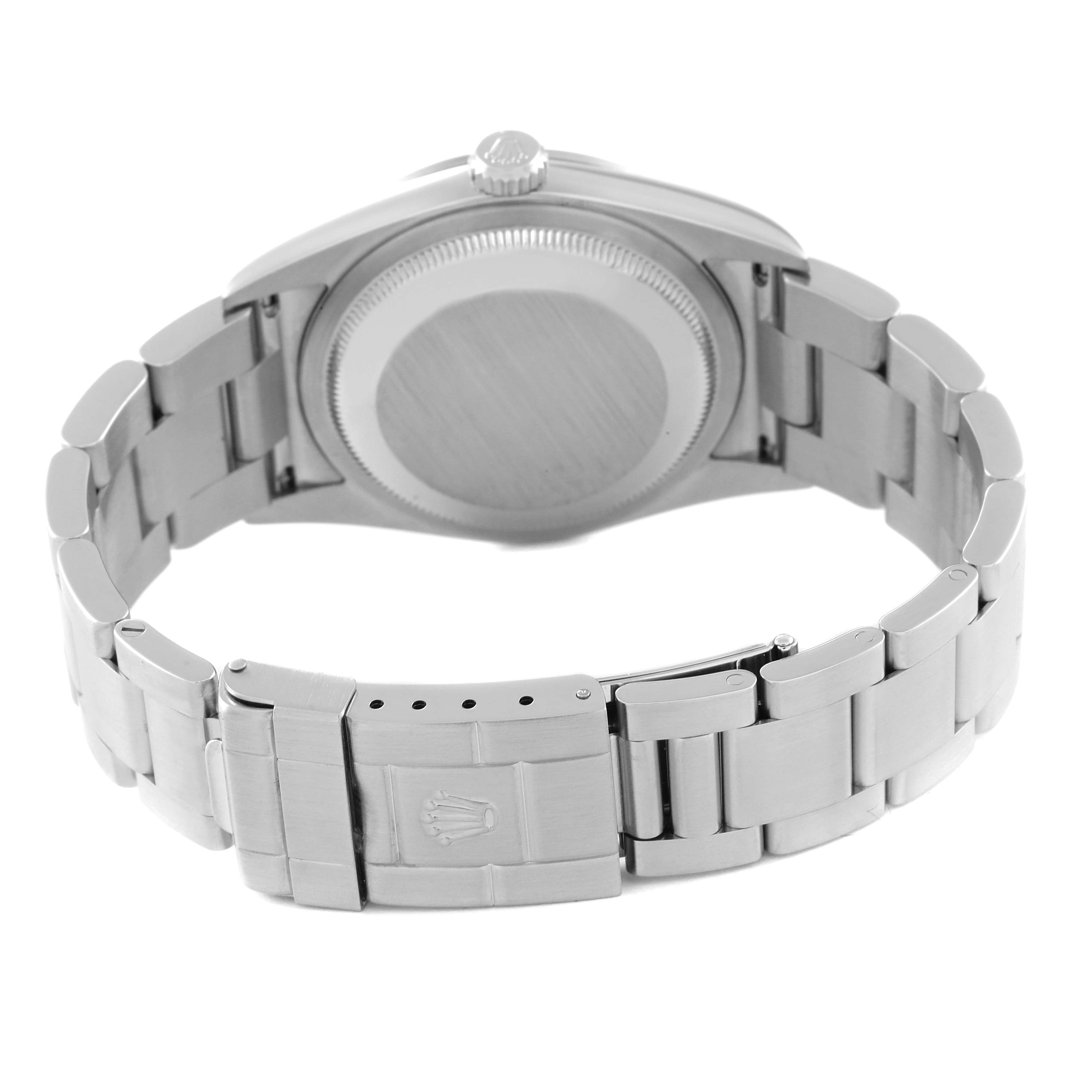 The image shows the back and bracelet of a Rolex Explorer 114270 Men
s Stainless Steel Black Dial 114270 Men
s Stainless Steel Black Dial watch, featuring the closed clasp with the Rolex logo.