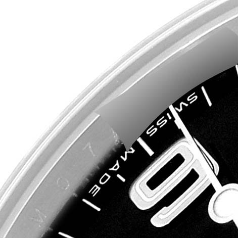 The image shows a close-up of the dial and bezel edge of a Rolex Explorer 114270 Men
s Stainless Steel Black Dial 114270 Men
s Stainless Steel Black Dial watch, highlighting the "Swiss Made" text and part of the numeral 6.