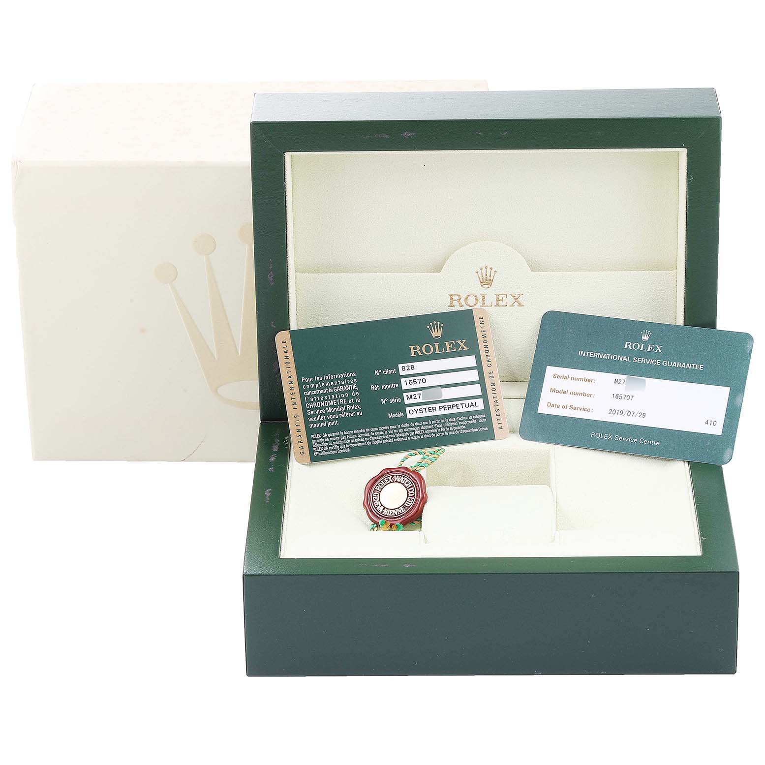 The image features a Rolex Explorer 16570 Men's Stainless Steel Black Dial 16570 Men's Stainless Steel Black Dial watch box, guarantee cards, and a hologram seal from a top-front angle.