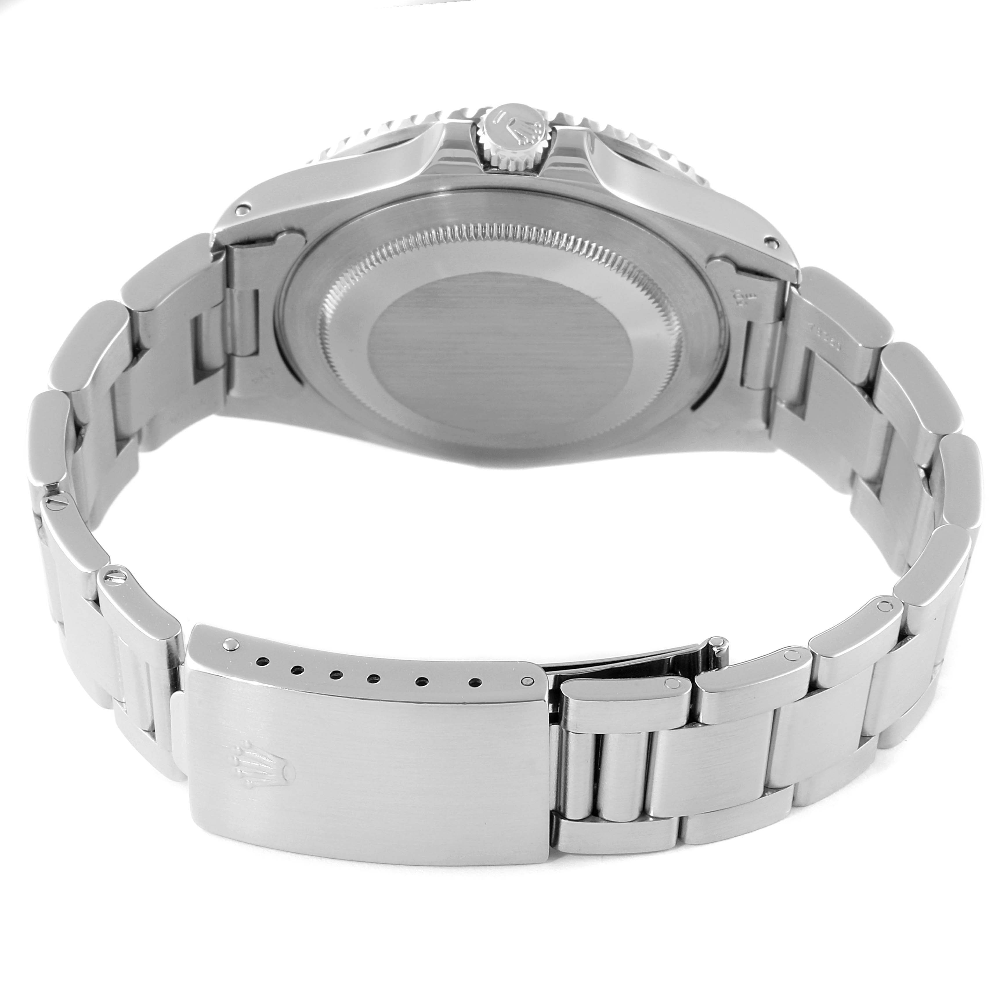 The image shows a rear view of the Rolex GMT-Master 16700 Men's Stainless Steel Black Dial 16700 Men's Stainless Steel Black Dial watch, highlighting the case back, bracelet, and clasp.