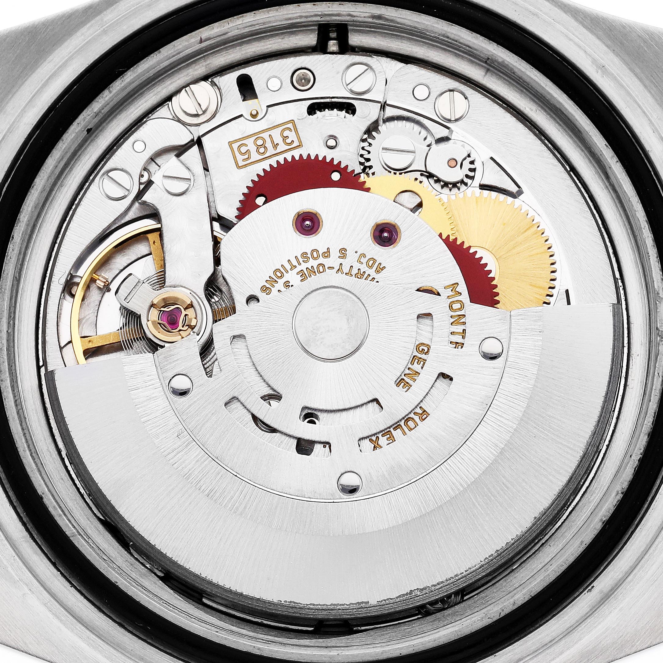 The image shows the movement of a Rolex GMT-Master 16713 Men
s Steel and Gold (two tone) Champagne Dial 16713 Men
s Steel and Gold (two tone) Champagne Dial watch from a top-down angle, highlighting gears and balance wheel.