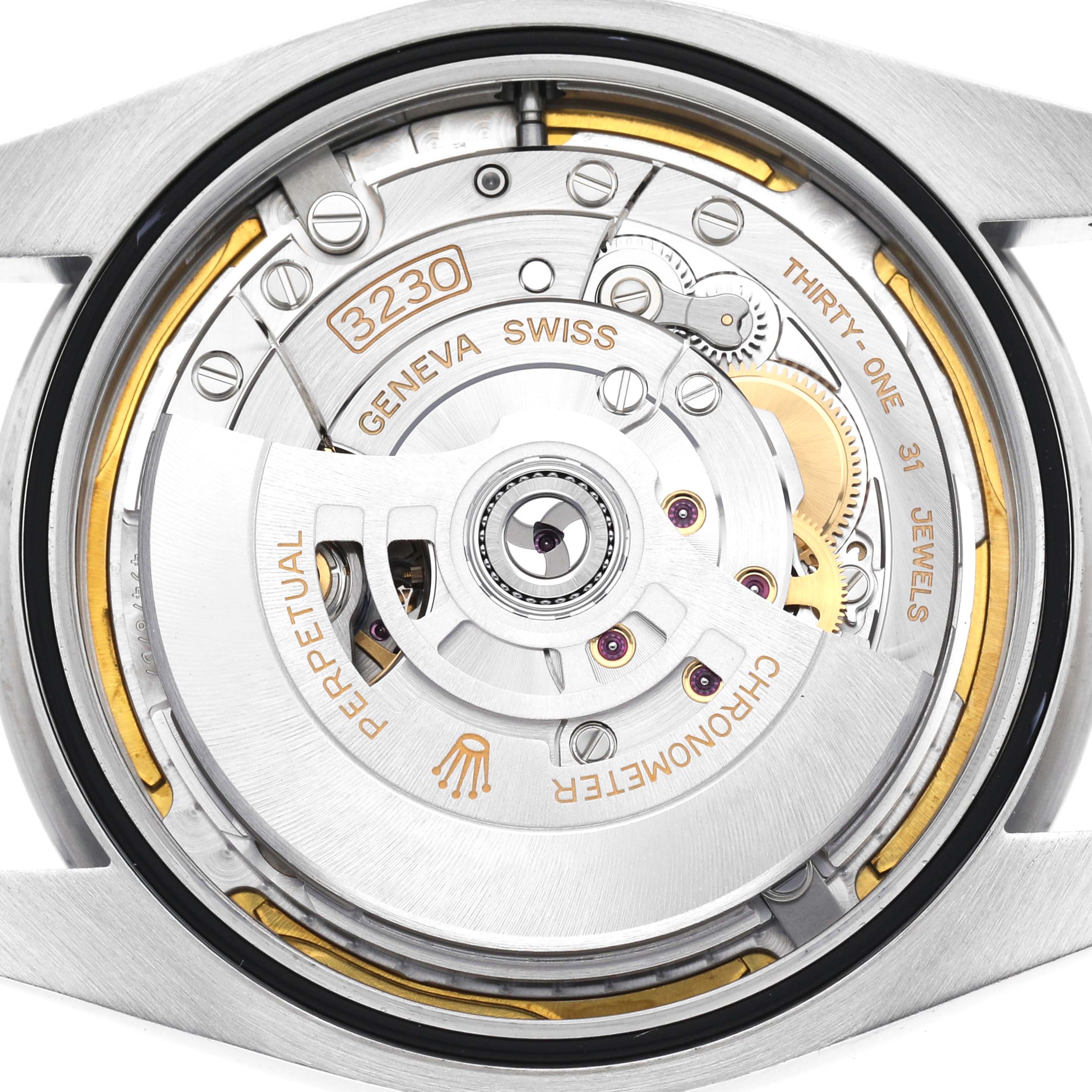 The image shows the movement of a Rolex Oyster Perpetual 124300 Men
s Stainless Steel Green Dial 124300 Men
s Stainless Steel Green Dial watch from a top-down angle, highlighting the rotor and internal components.