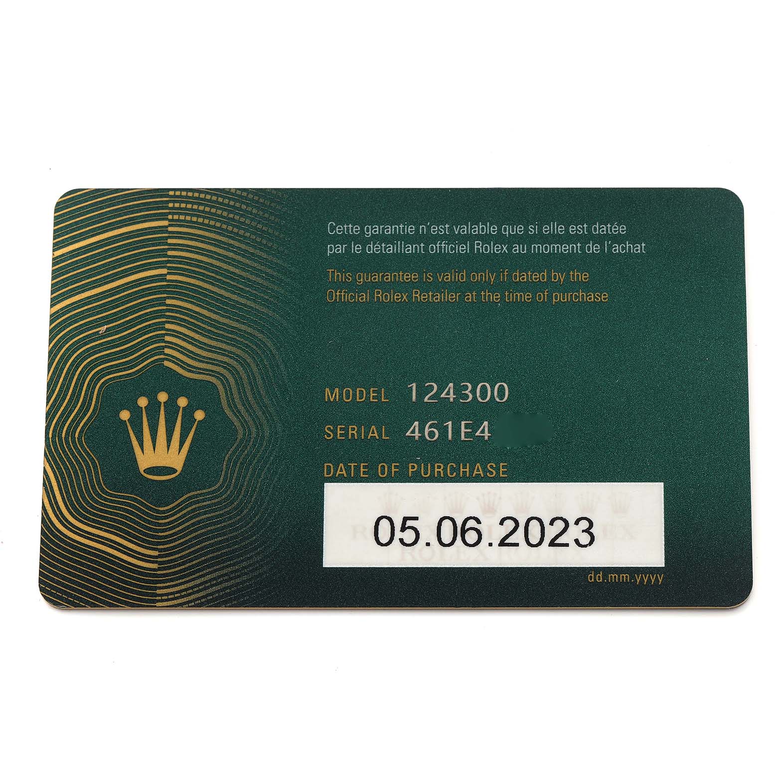The image shows a warranty card for a Rolex Oyster Perpetual 124300 Men
s Stainless Steel Green Dial 124300 Men
s Stainless Steel Green Dial, featuring model and serial numbers, and purchase date.