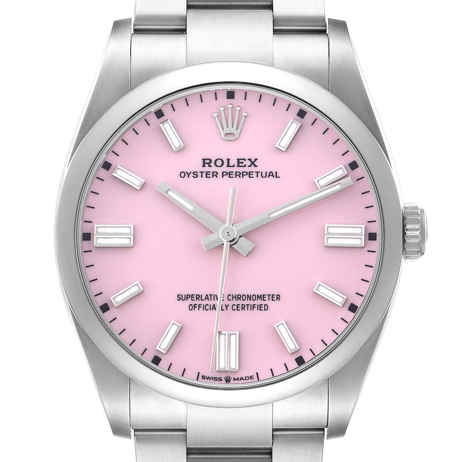 The image shows a front view of a Rolex Oyster Perpetual, highlighting its pink dial, hands, and bracelet.