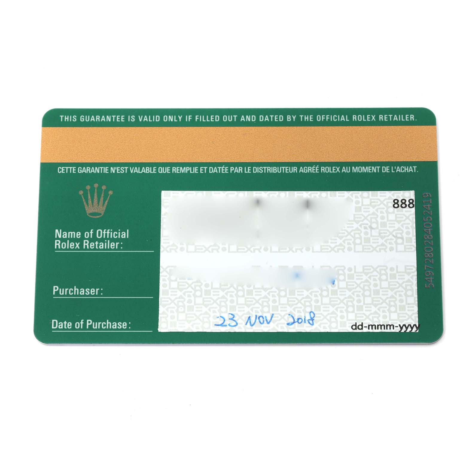 The image shows the guarantee card for a Rolex Oyster Perpetual 114200 Men's Stainless Steel Green Dial 114200 Men's Stainless Steel Green Dial model, featuring details like the name of the retailer and the date of purchase.