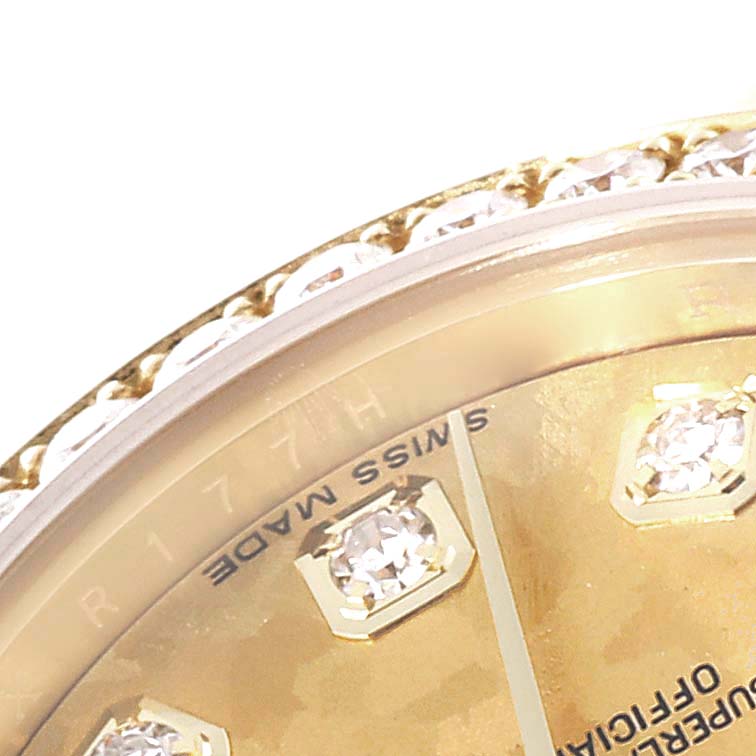 The image shows a close-up of the dial and diamond markers with part of the bezel of a Rolex President 179158 Women
s Yellow Gold Champagne Dial 179158 Women
s Yellow Gold Champagne Dial model watch.