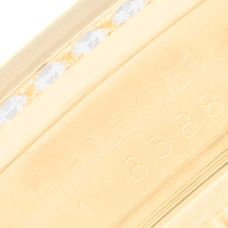 The image shows a close-up angle of the engraved gold link and diamond-set bezel of a Rolex President 118388 Men
s Yellow Gold Champagne Dial 118388 Men
s Yellow Gold Champagne Dial model watch.