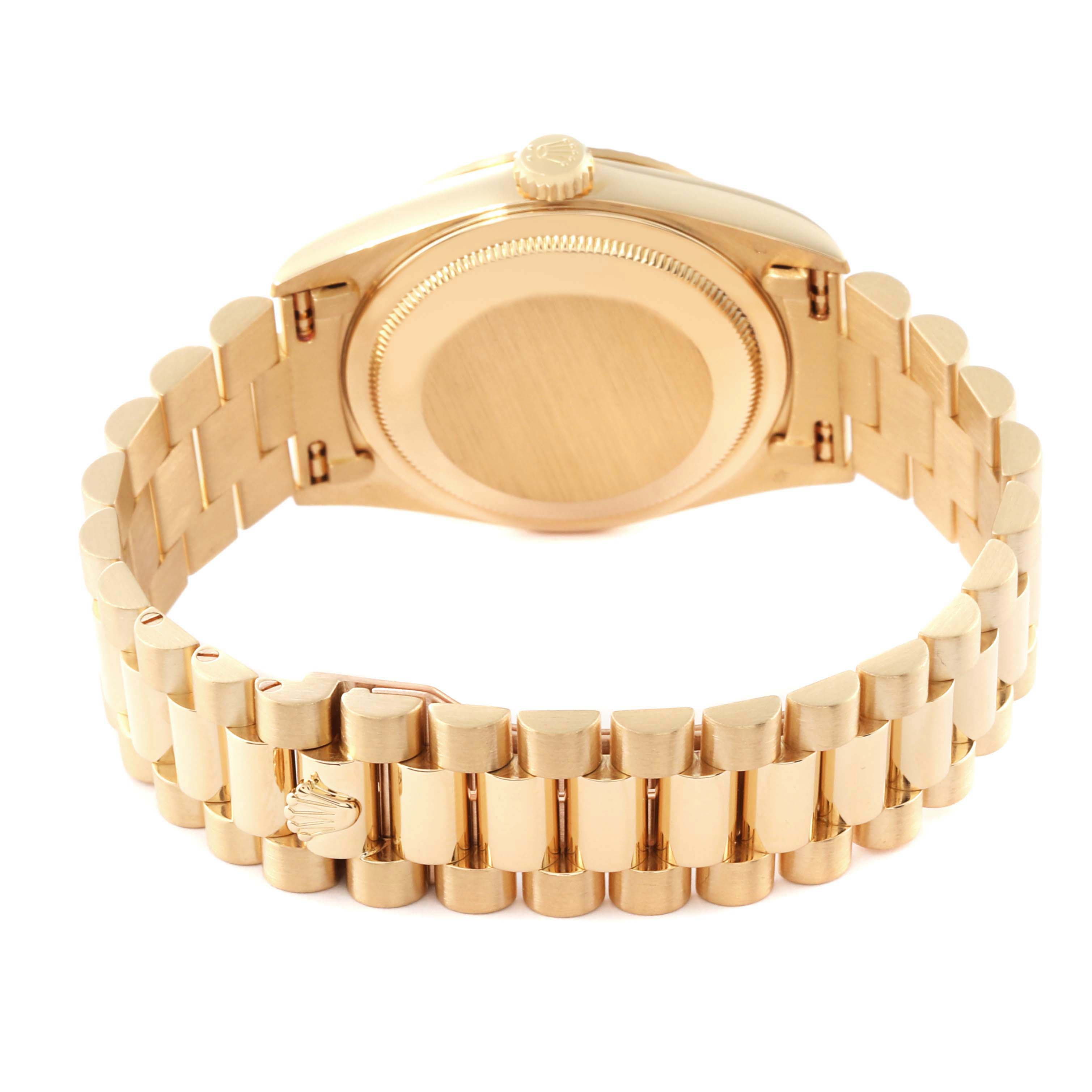 The image shows the back of a Rolex President 18238 Men's Yellow Gold White Dial 18238 Men's Yellow Gold White Dial watch, highlighting the case back and the gold bracelet with clasp.