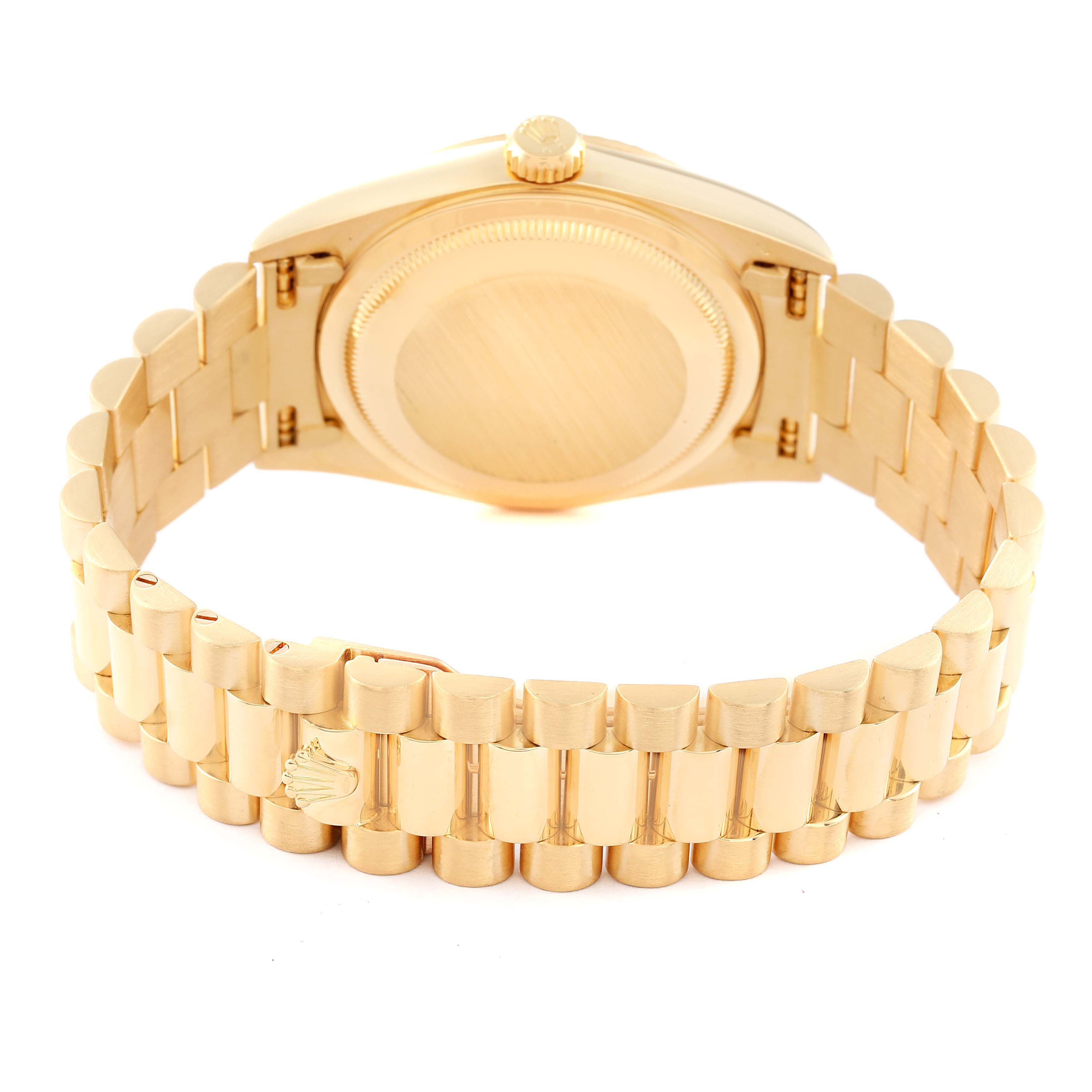 The image shows the backside and bracelet of a Rolex President 18238 Men's Yellow Gold Blue Dial 18238 Men's Yellow Gold Blue Dial model watch, highlighting the link design and clasp.