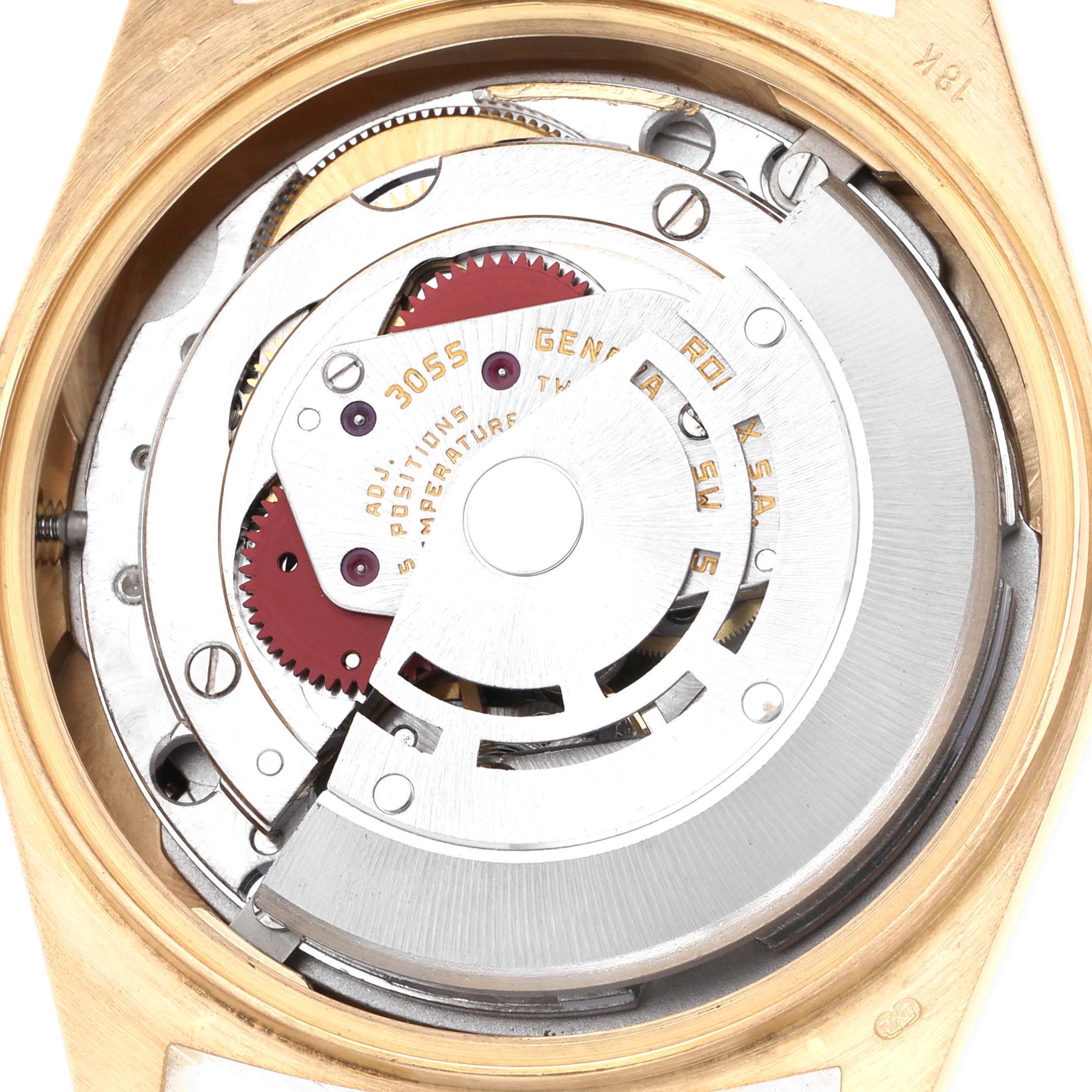 The image shows the internal mechanism of a Rolex President 18038 Men
s Yellow Gold Champagne Dial 18038 Men
s Yellow Gold Champagne Dial watch, focusing on the movement from a top-down angle.