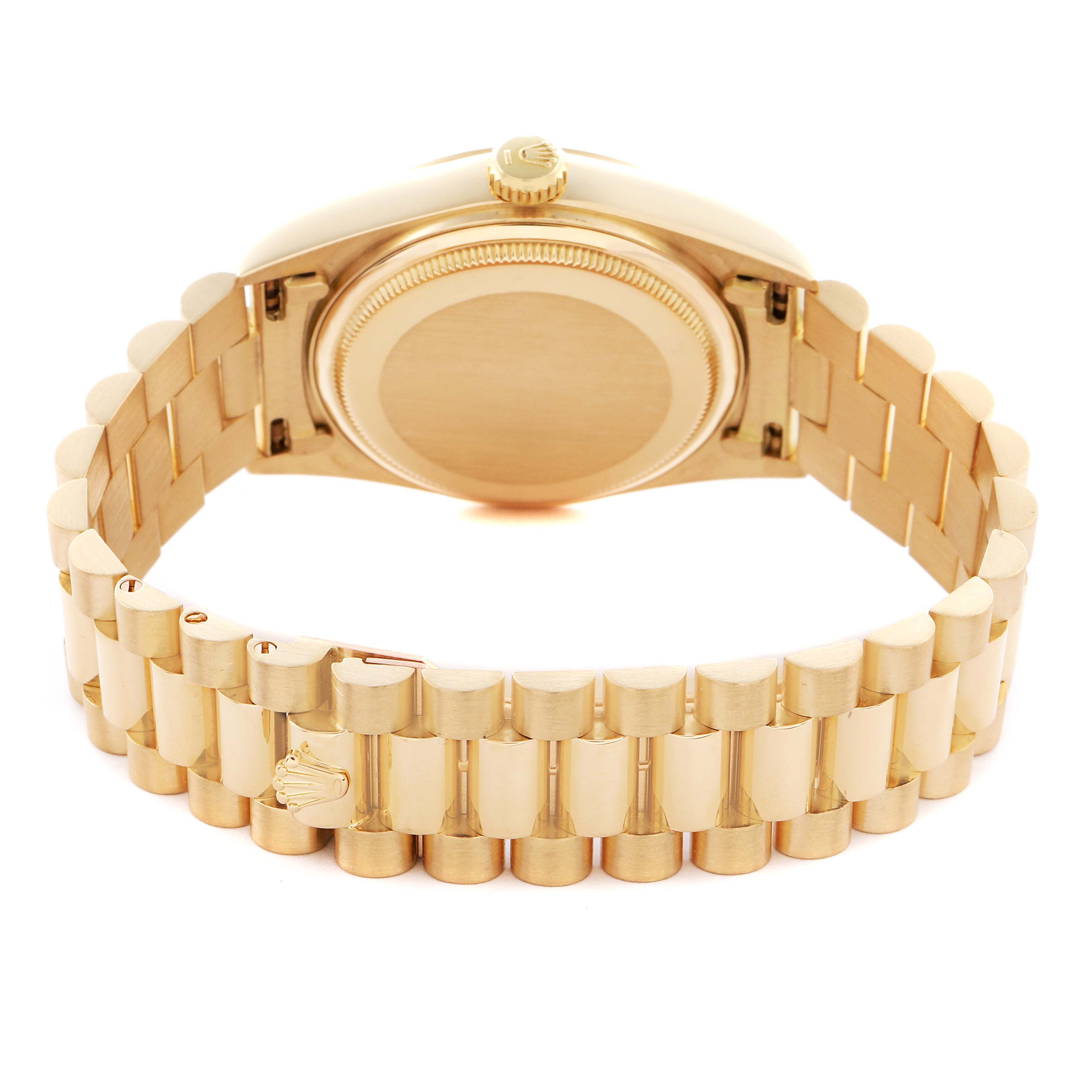 The image shows the back and bracelet of a Rolex President 18038 Men
s Yellow Gold Champagne Dial 18038 Men
s Yellow Gold Champagne Dial model watch, highlighting the clasp and case back.