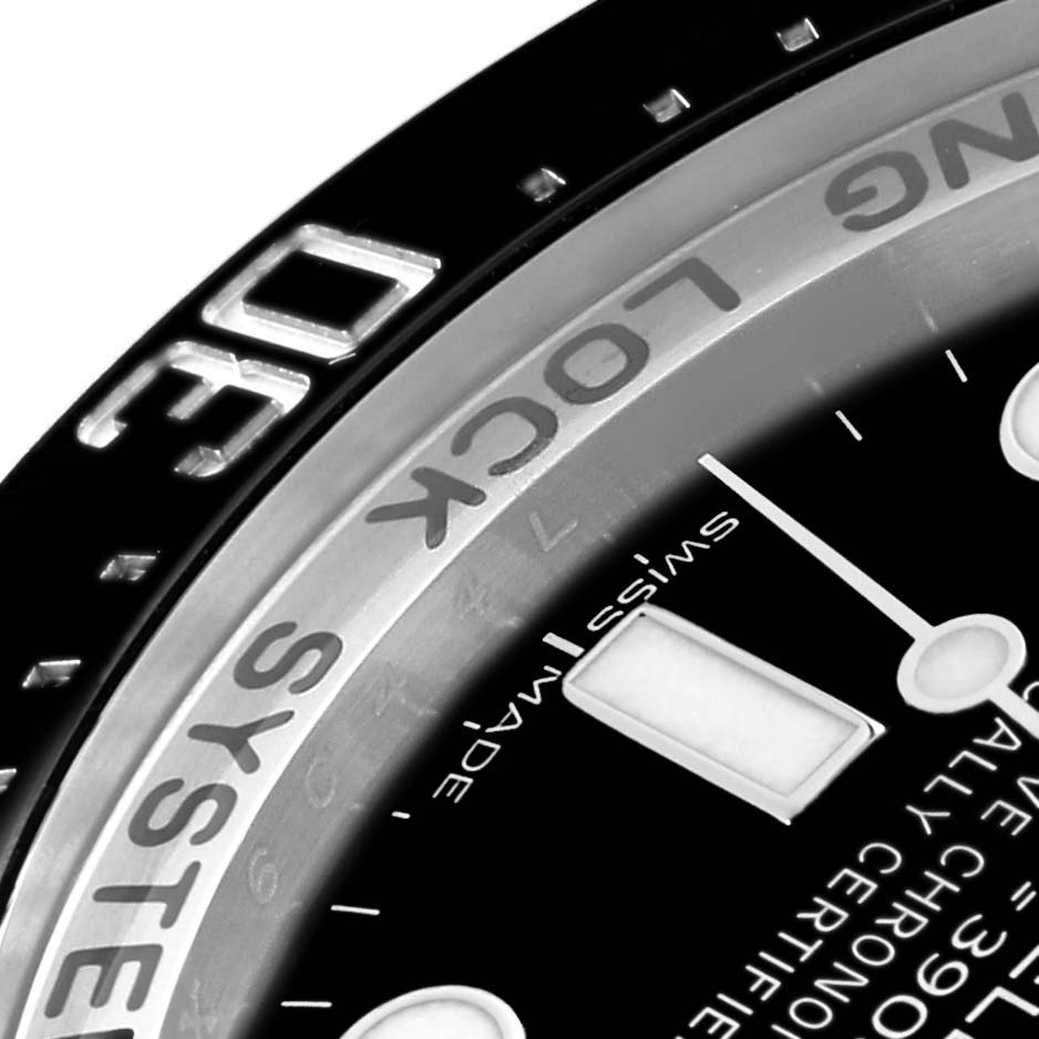 The image shows a close-up angle of the bezel and part of the dial of the Rolex Sea-Dweller 116660 Men
s Stainless Steel Blue Dial 116660 Men
s Stainless Steel Blue Dial watch.