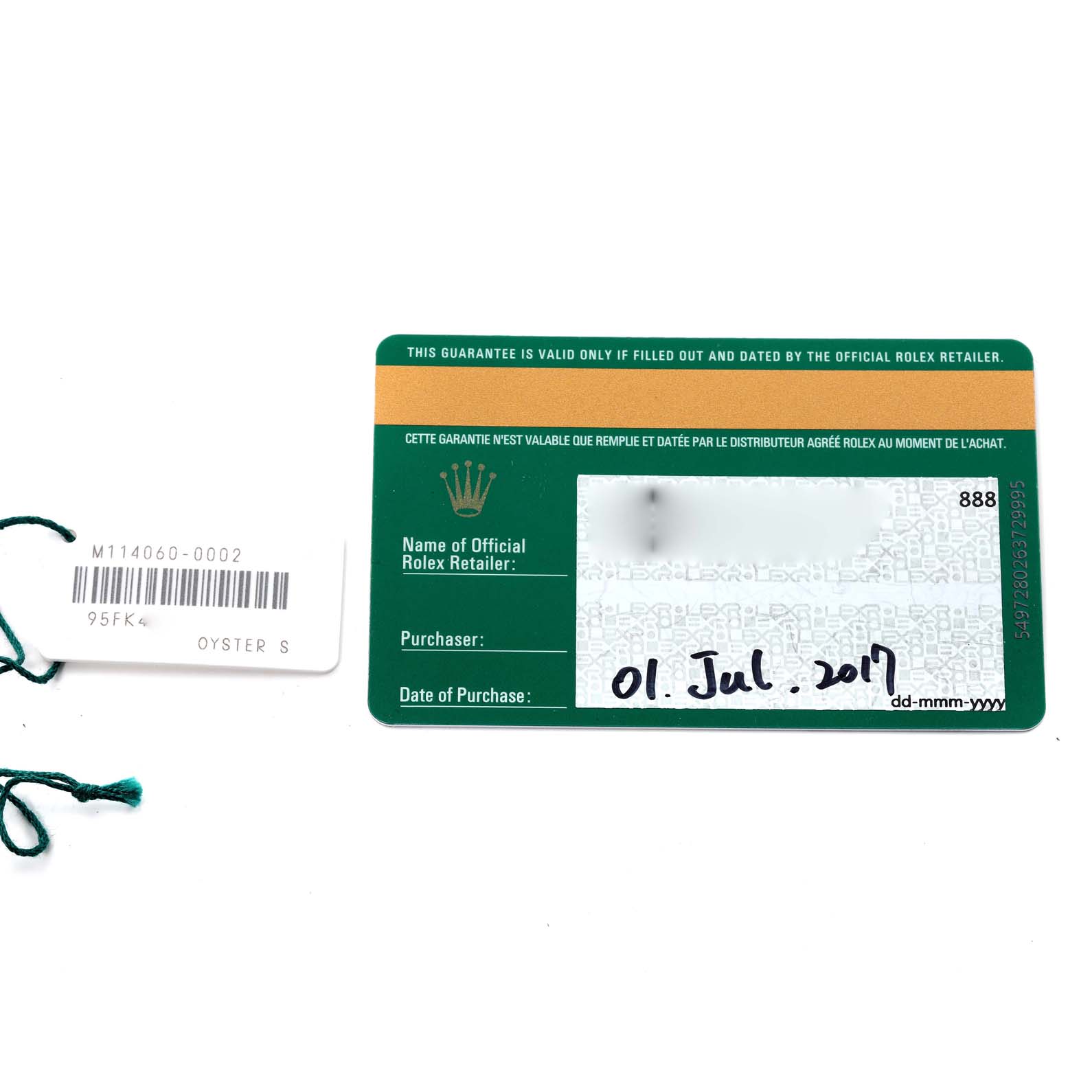 This image shows the guarantee card and tag of a Rolex Submariner 114060 Men
s Stainless Steel Black Dial 114060 Men
s Stainless Steel Black Dial watch.