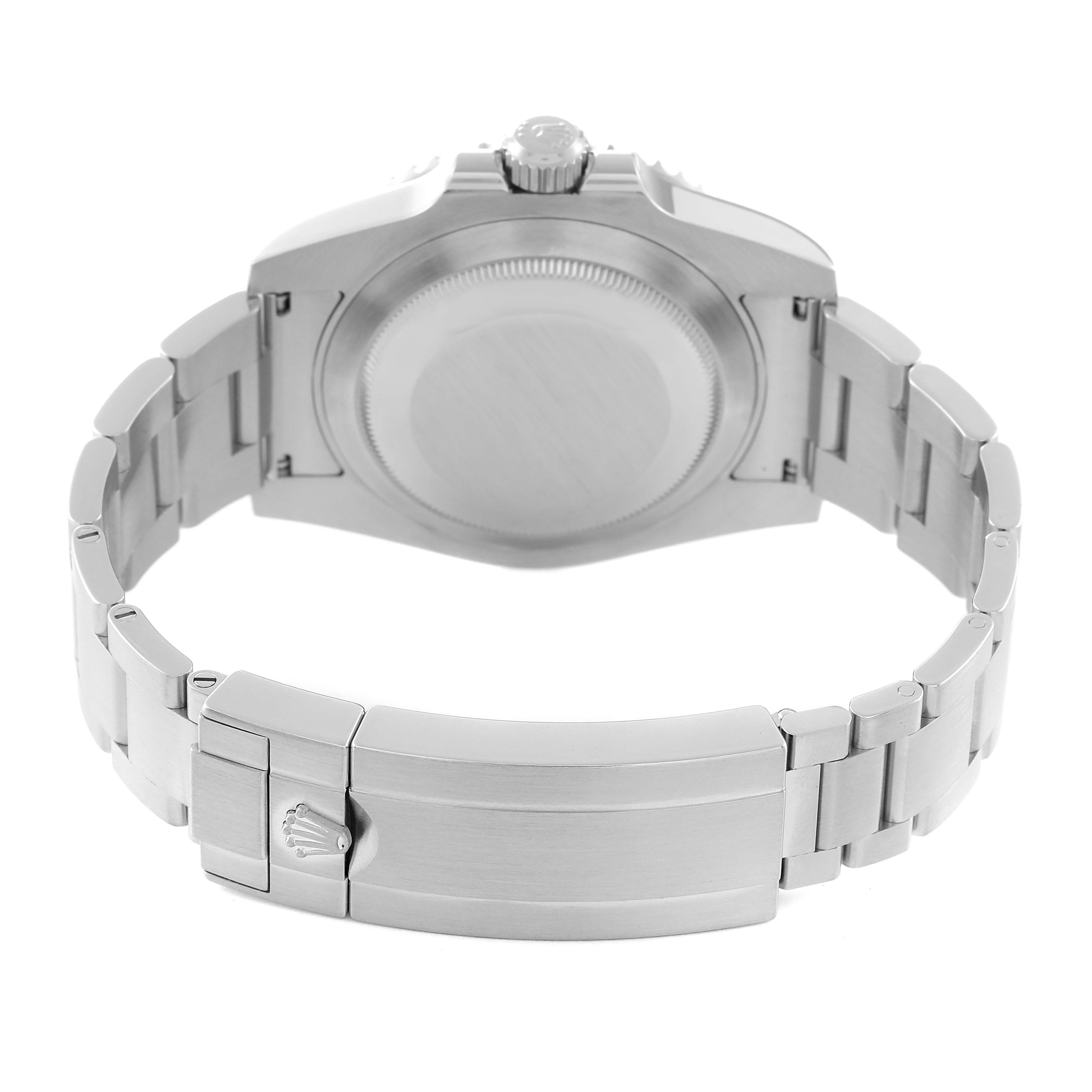 The Rolex Submariner 114060 Men
s Stainless Steel Black Dial 114060 Men
s Stainless Steel Black Dial watch is shown from the back, highlighting its case back and metal bracelet with clasp.