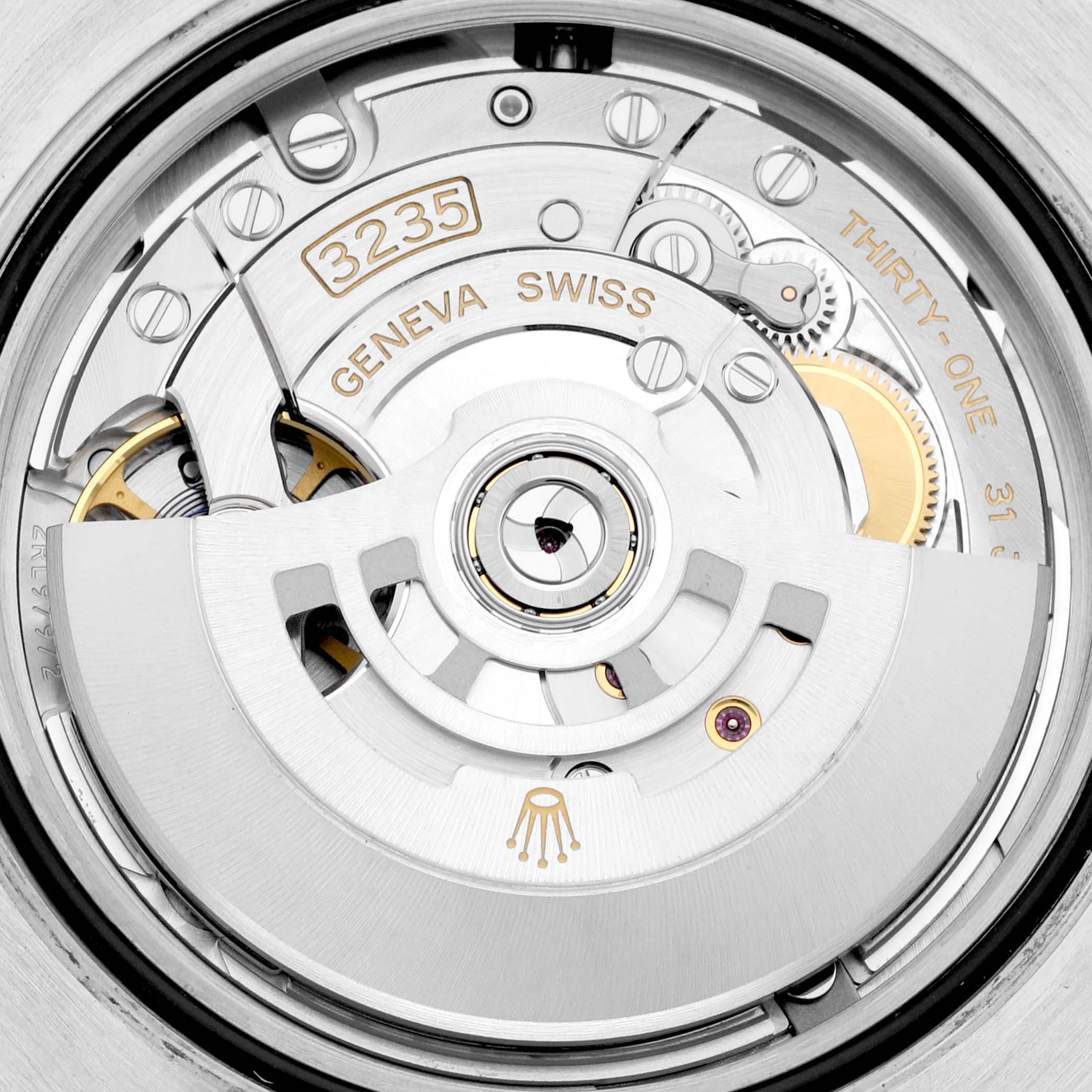 The image shows a close-up view of the Rolex Submariner 126613LB Men's Steel and Gold (two tone) Blue Dial 126613LB Men's Steel and Gold (two tone) Blue Dial watch's 3235 movement mechanism.