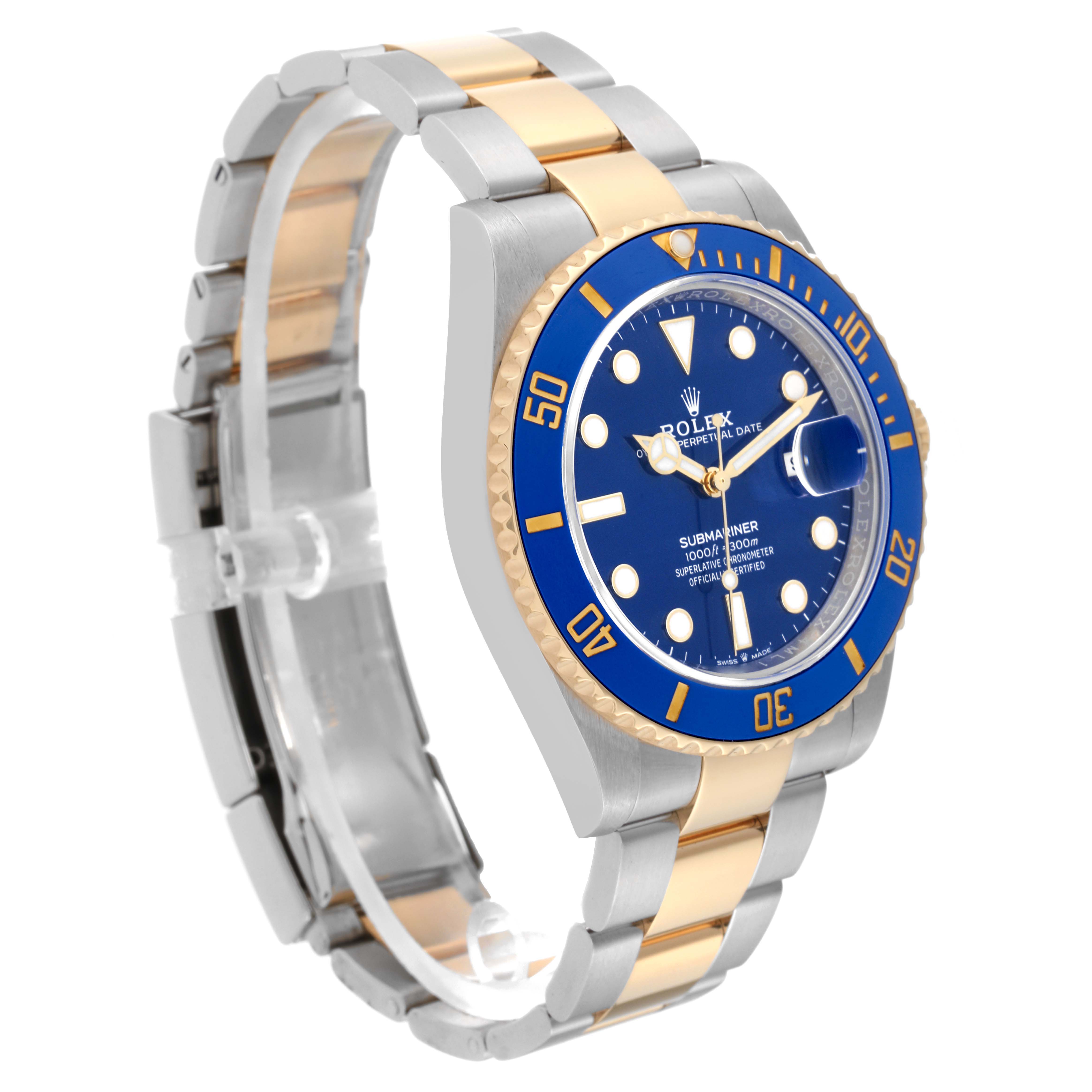 The image shows a Rolex Submariner 126613LB Men's Steel and Gold (two tone) Blue Dial 126613LB Men's Steel and Gold (two tone) Blue Dial watch angled to display the watch face, bezel, and two-tone strap.