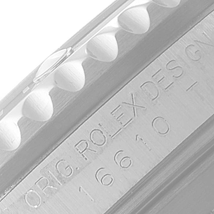 This image shows a close-up of the engraved side and bezel edge of a Rolex Submariner 16610 Men
s Stainless Steel Black Dial 16610 Men
s Stainless Steel Black Dial watch.