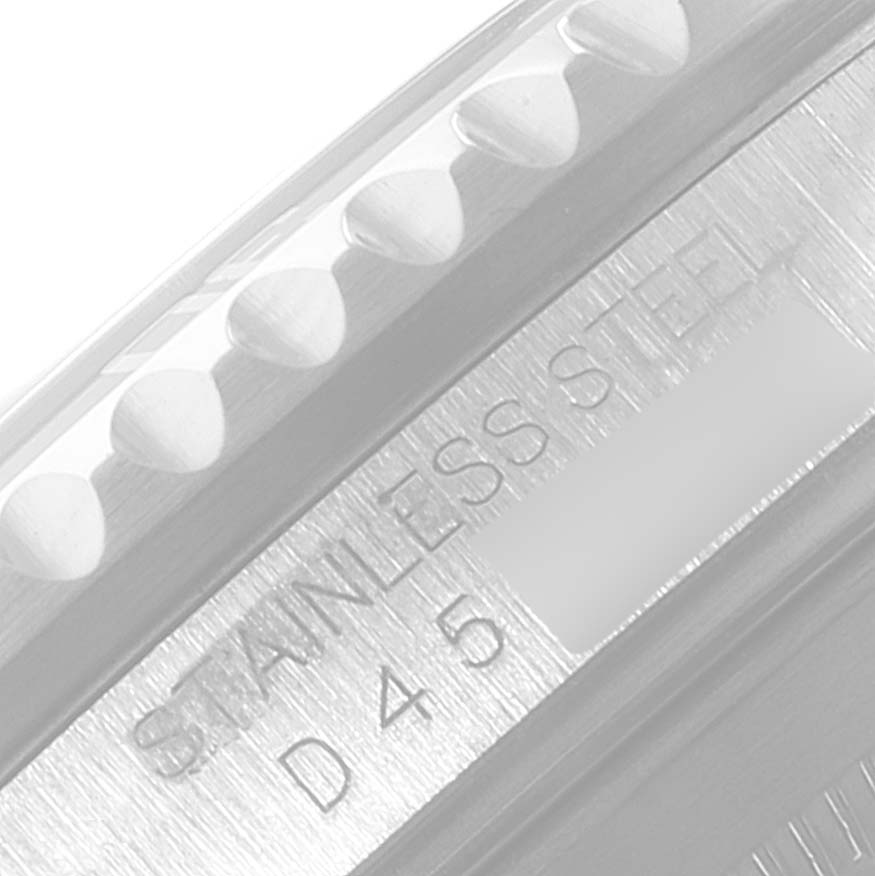 This image shows the side view of the bezel and part of the etched engravings on the case of a Rolex Submariner 16610 Men
s Stainless Steel Black Dial 16610 Men
s Stainless Steel Black Dial watch.