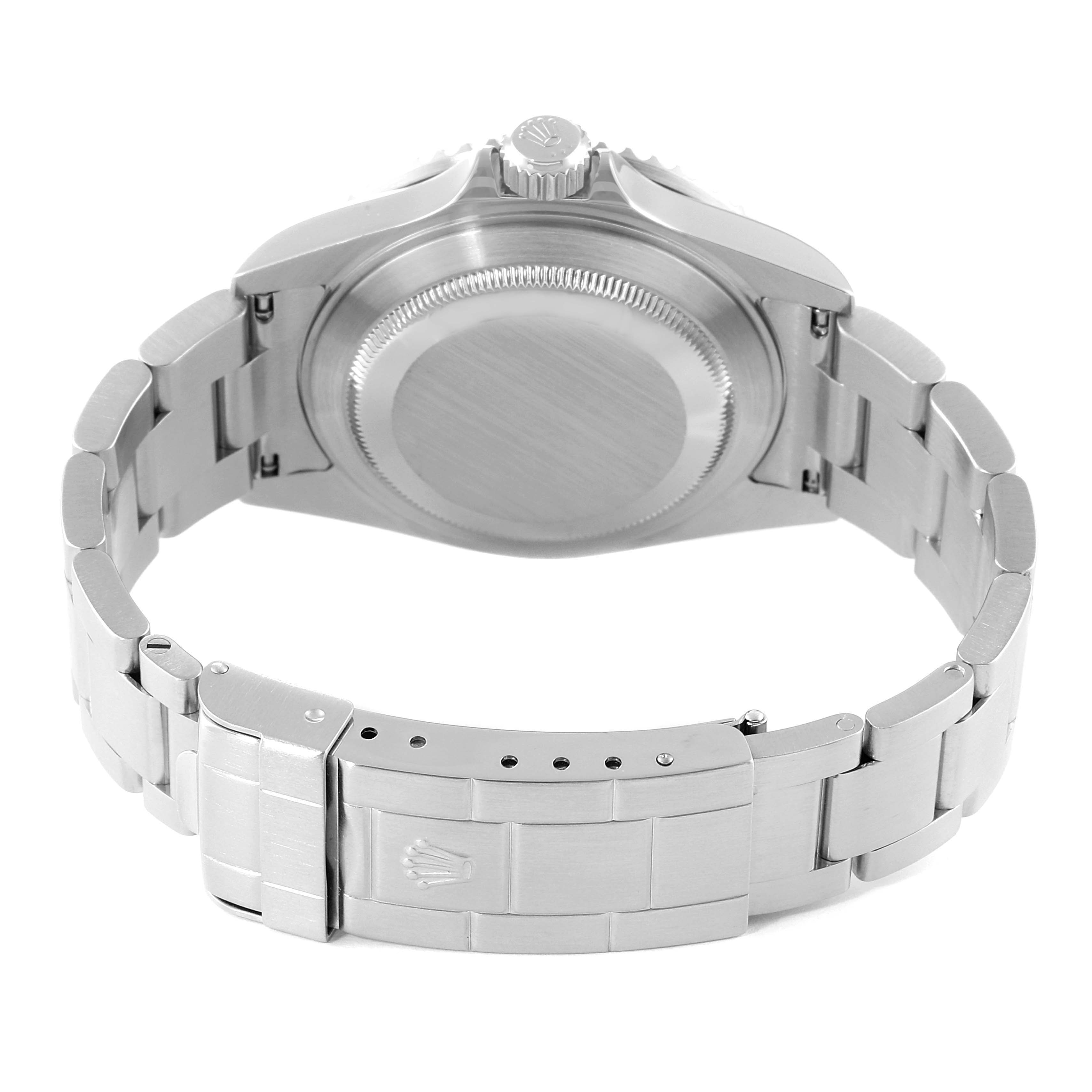 This image shows the back view of the Rolex Submariner 16610 Men
s Stainless Steel Black Dial 16610 Men
s Stainless Steel Black Dial watch, including the case back and partially opened bracelet clasp.