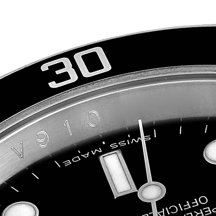 This image shows a close-up of the bezel and dial of a Rolex Submariner 16610 Men's Stainless Steel Black Dial 16610 Men's Stainless Steel Black Dial watch, focusing on the "30" indicator and "Swiss Made" text.